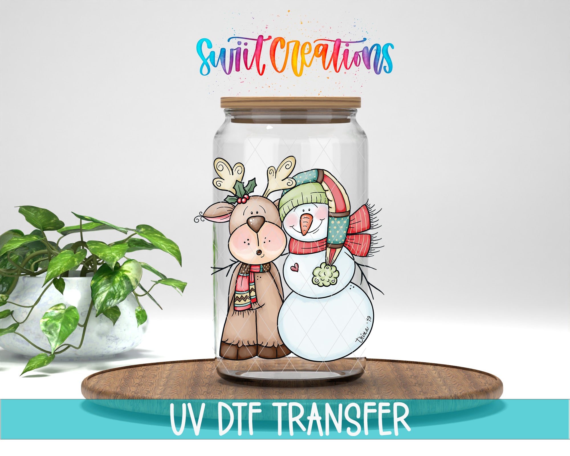 A glass jar containing a cartoon illustration of a reindeer and a snowman, with the text "Swift Creations" above the jar.