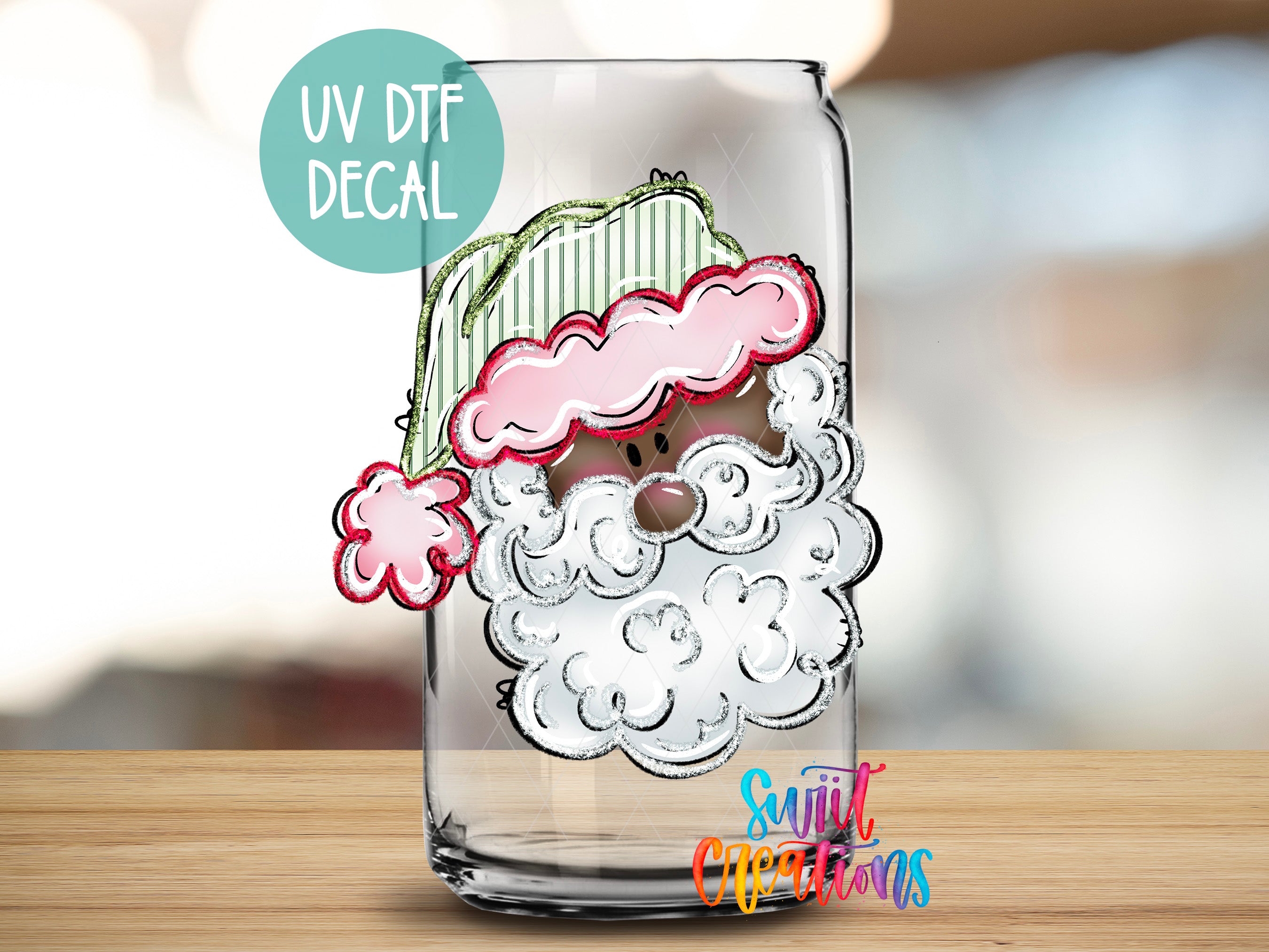 A glass jar with a cartoon Santa Claus face drawn on it, along with a UV decal and text indicating it is a "UV DTF DECAL".