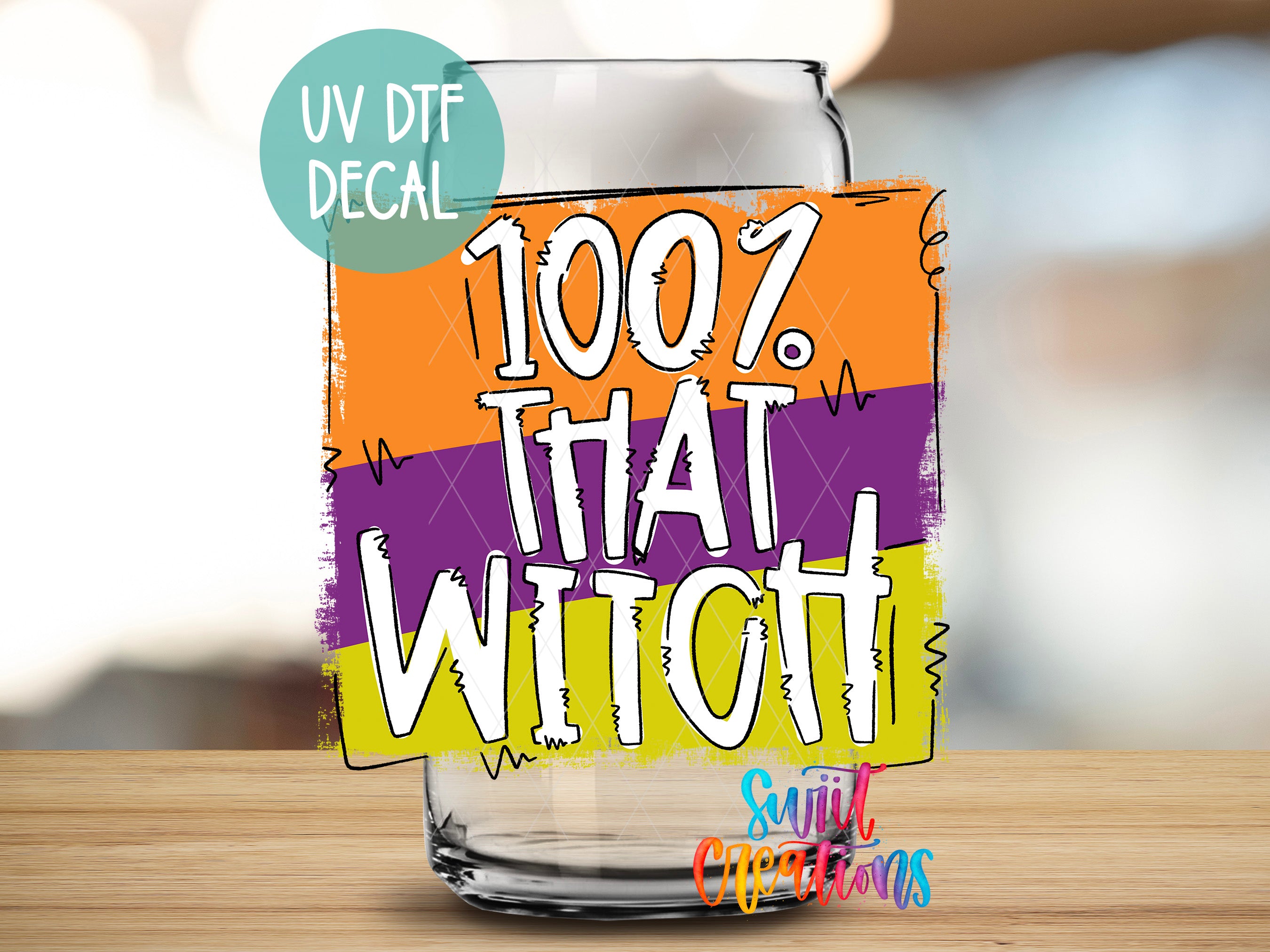 a glass with a sticker that says, 100 % that witch
