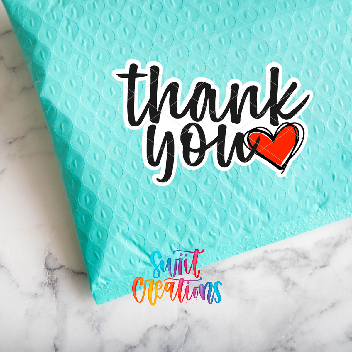 a thank you card with a heart on it
