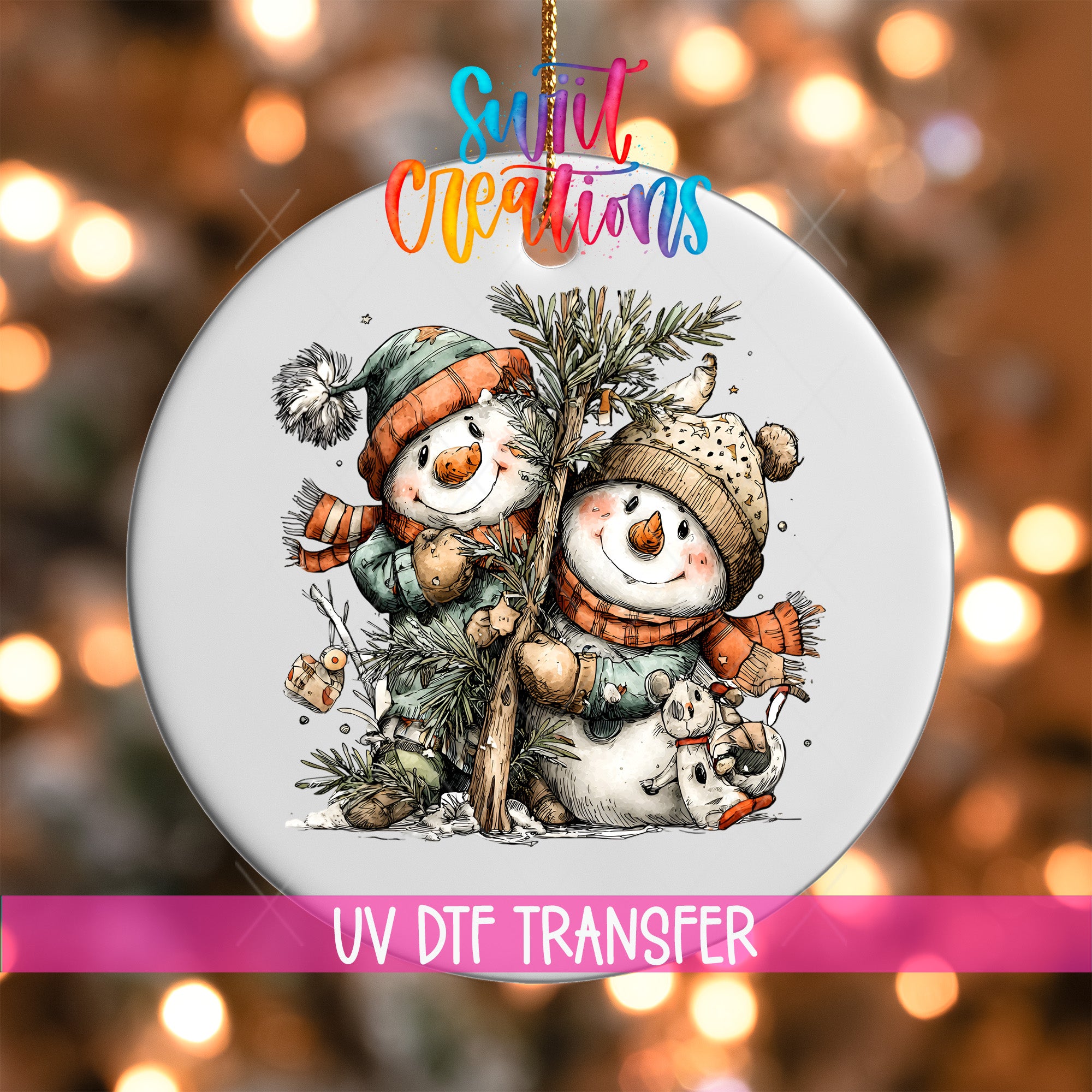A decorative ornament featuring two snowmen wearing winter hats and scarves, with a pine tree and other winter-themed elements. The ornament is hanging against a background with colorful lights, creating a festive atmosphere.