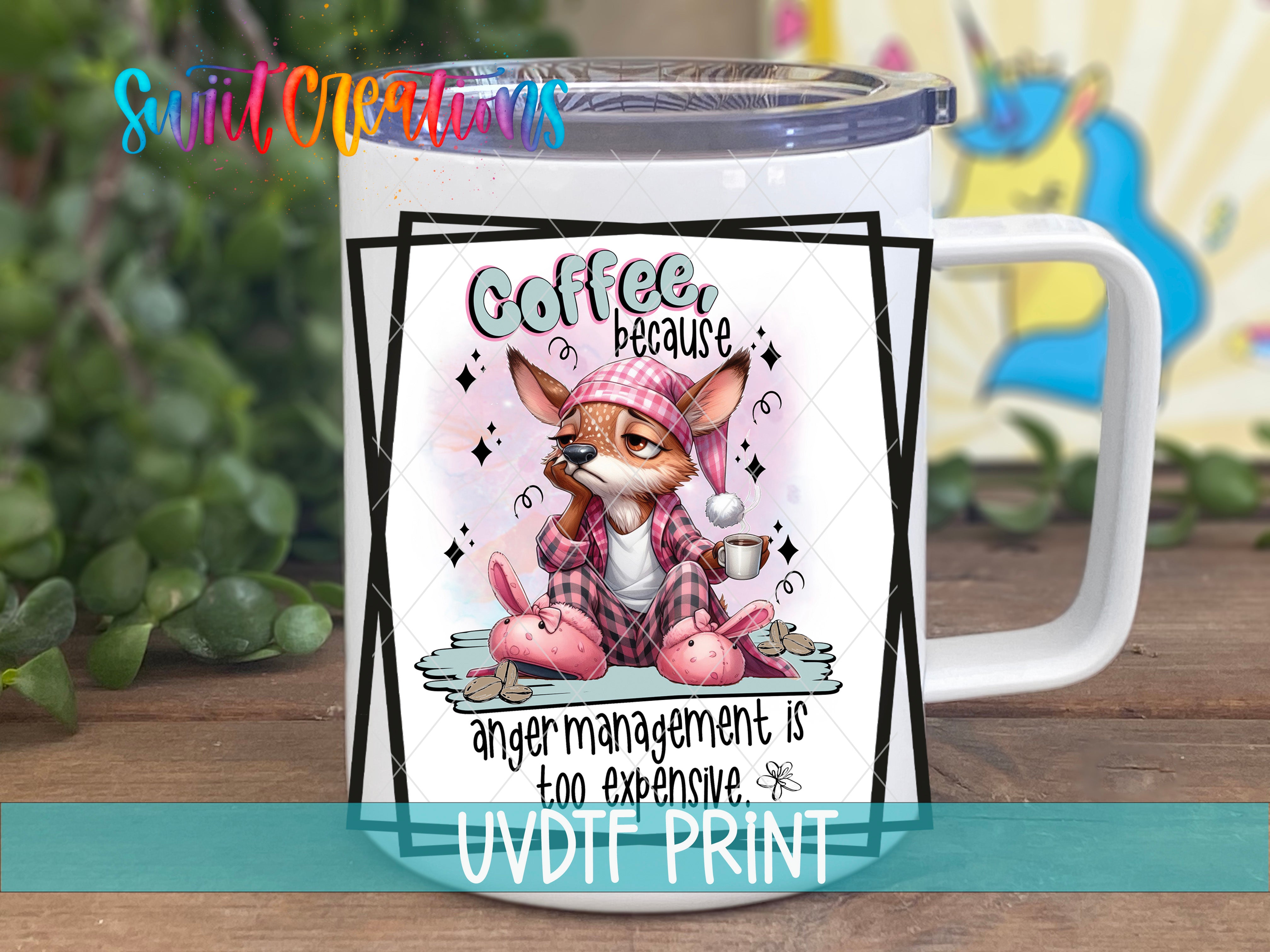 A white mug with a cartoon image of a cat wearing a hat and holding a cup of coffee, accompanied by text that reads "Coffee, because anger management is too expensive."