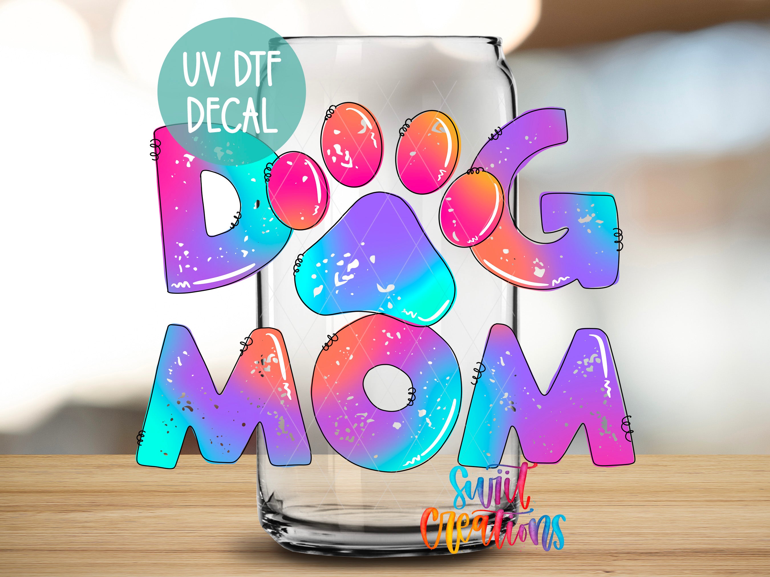 a glass with the words dog mom painted on it
