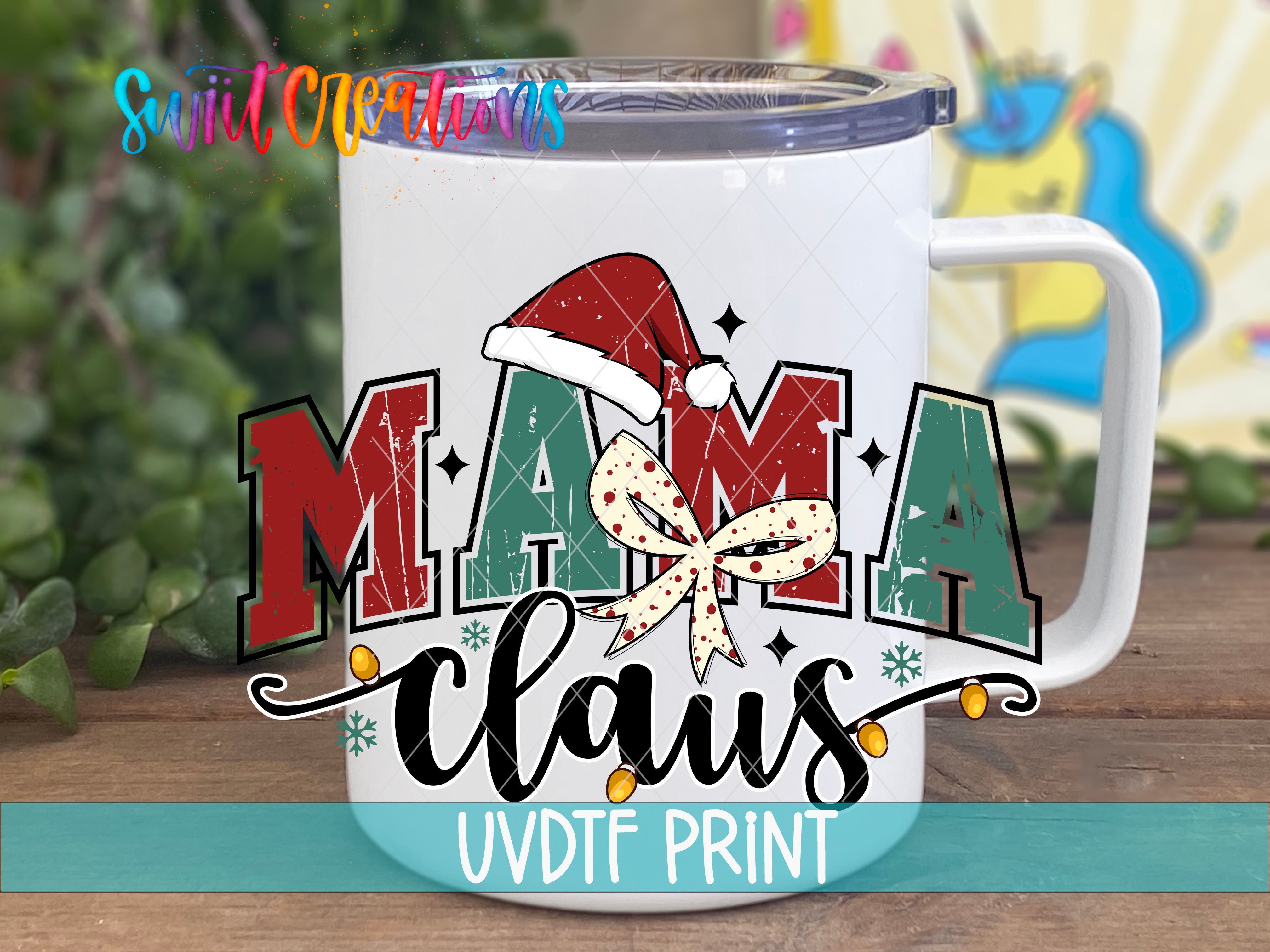 A white mug with a colorful design featuring the text "MAMA Claus" and a Santa hat, along with decorative elements such as snowflakes and stars.