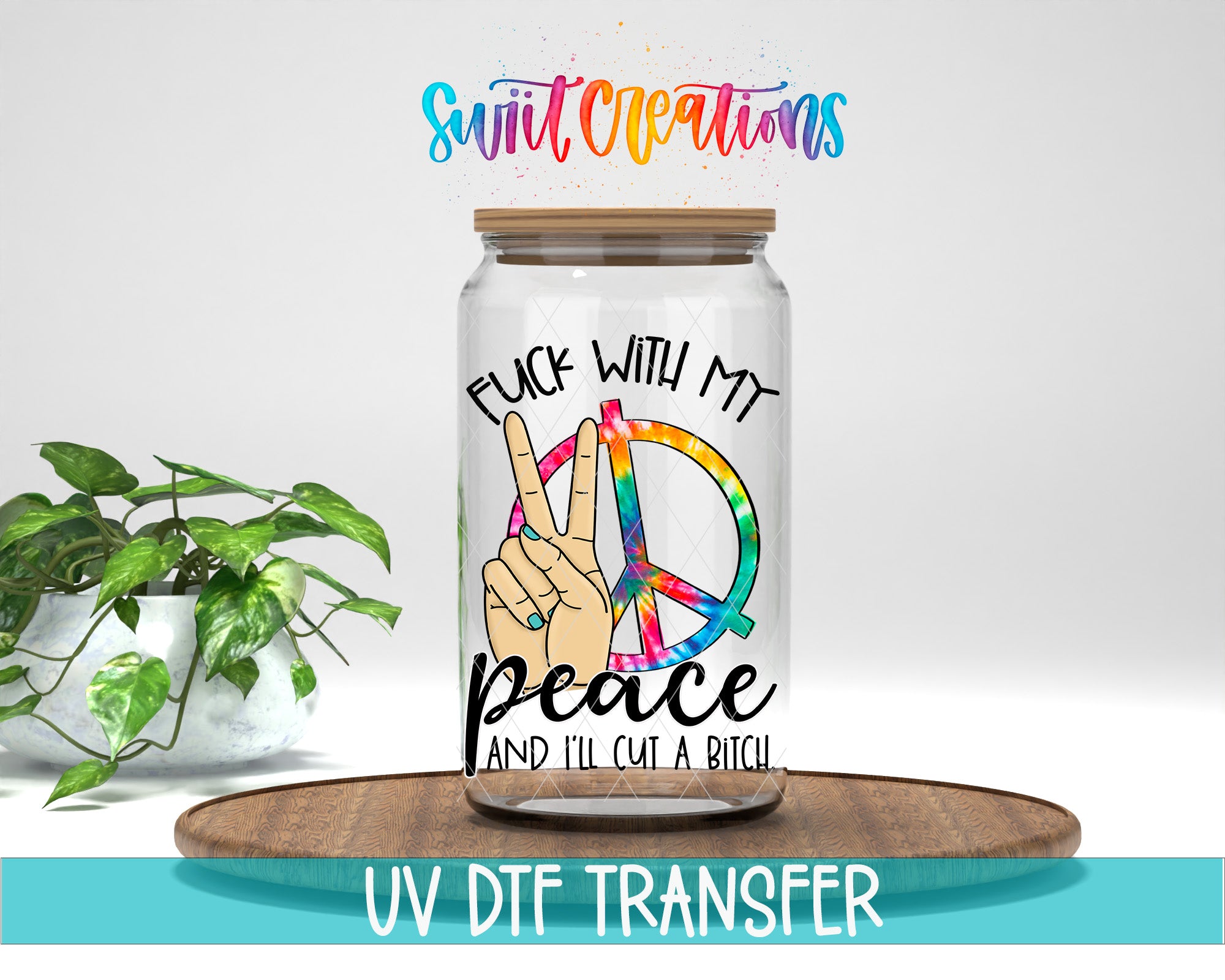 A glass jar with a peace sign and the text "FUCK WITH MY PEACE AND I'LL CUT A BITCH" printed on it, placed on a wooden surface. There is also a plant in the background.