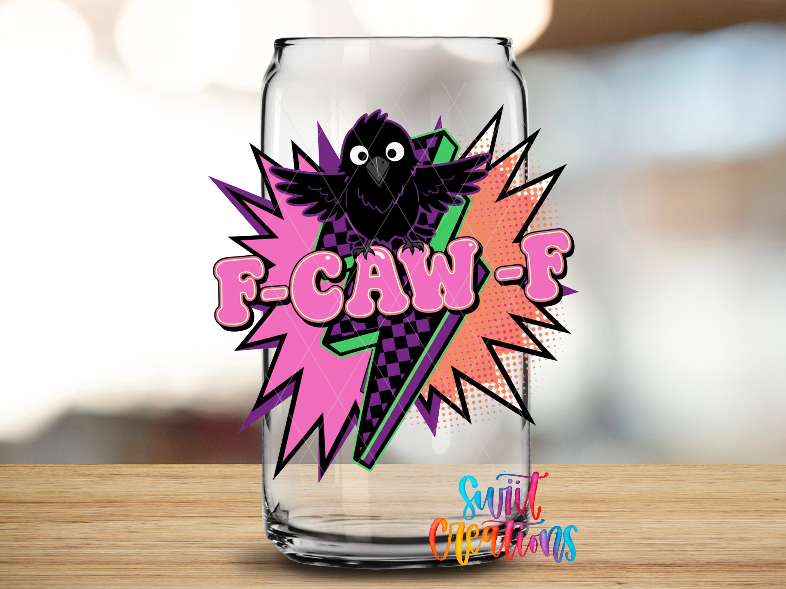 a glass can with a colorful, stylized design and text on it.