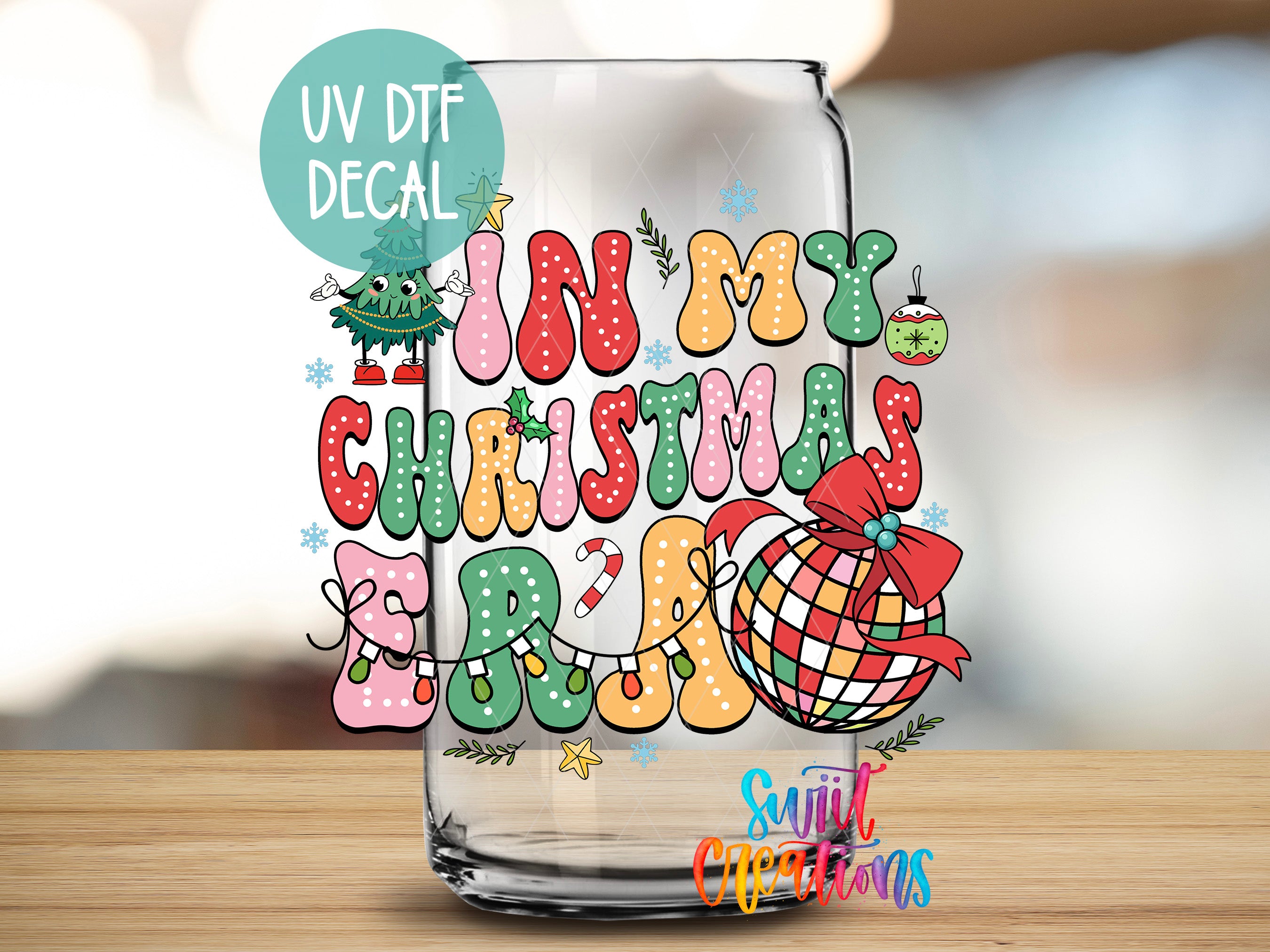 a glass with a christmas message on it