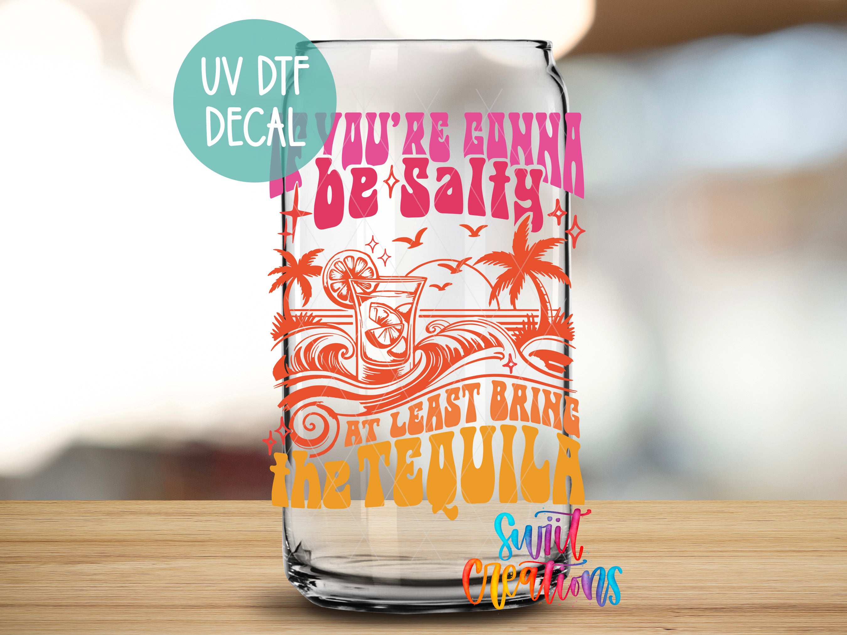 A glass can with a colorful, retro-style design featuring a tequila-themed illustration and text.