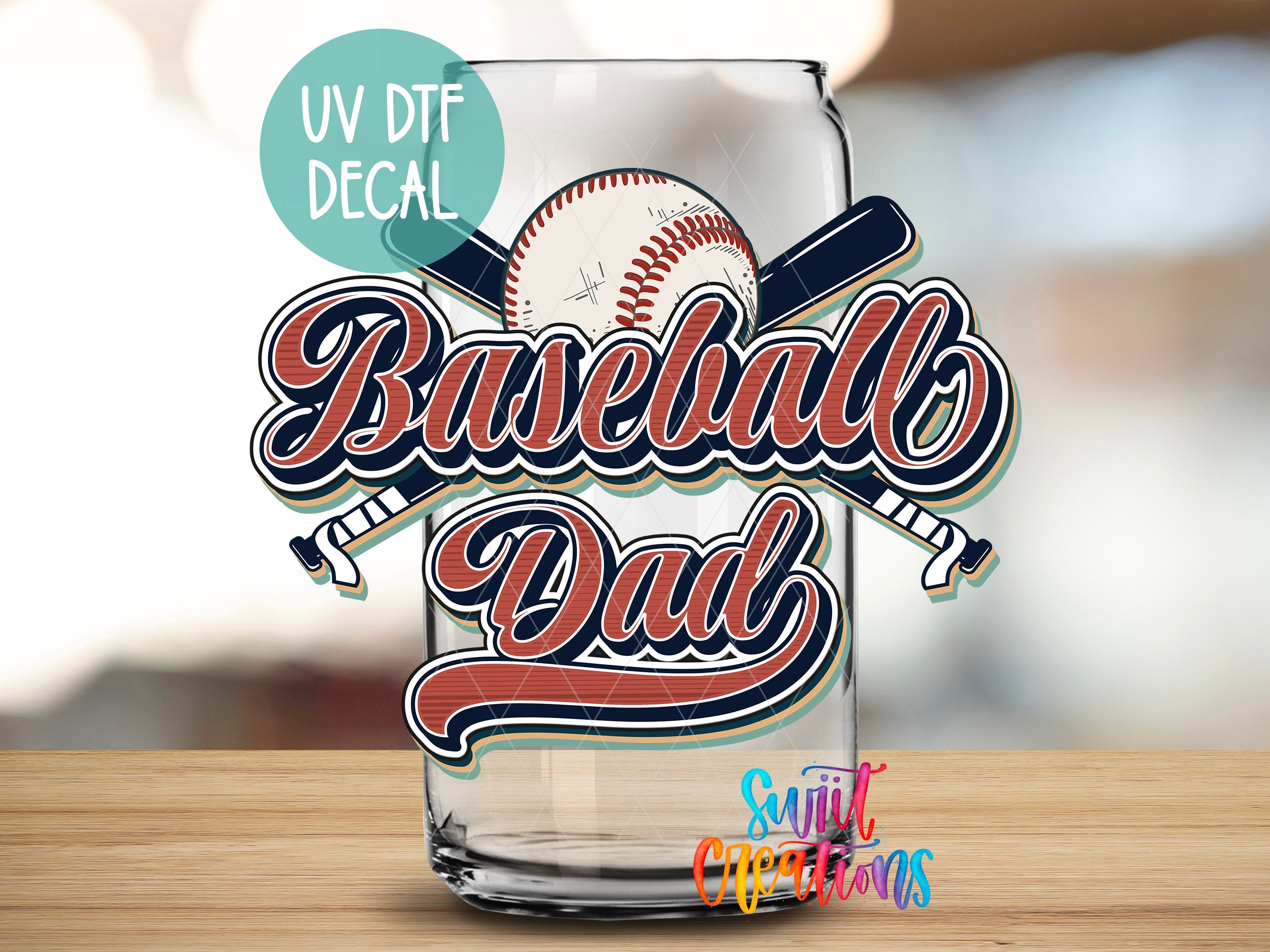 a shot glass with a baseball and bat on it