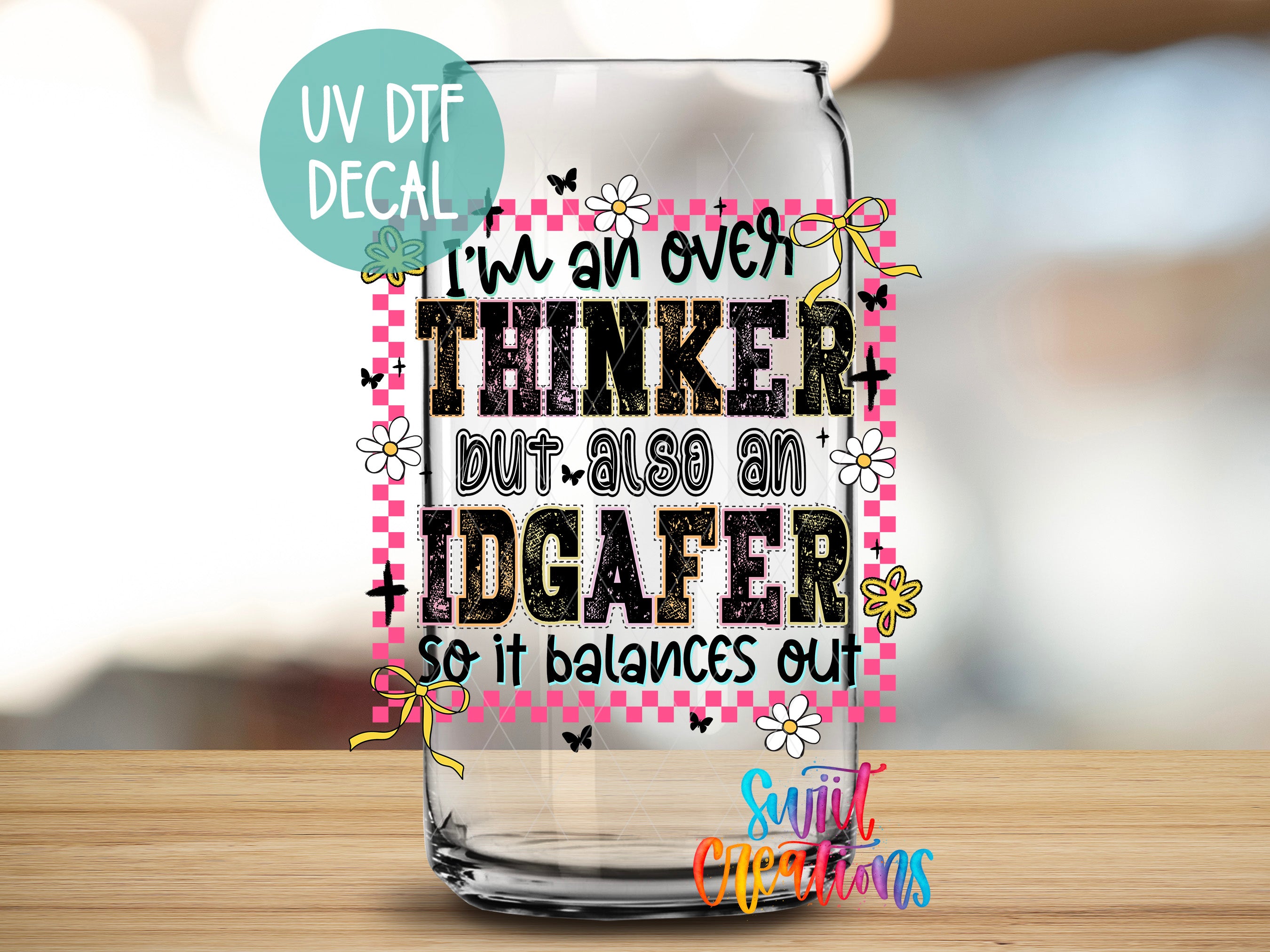 a glass jar with a decorative label that includes text and illustrations.