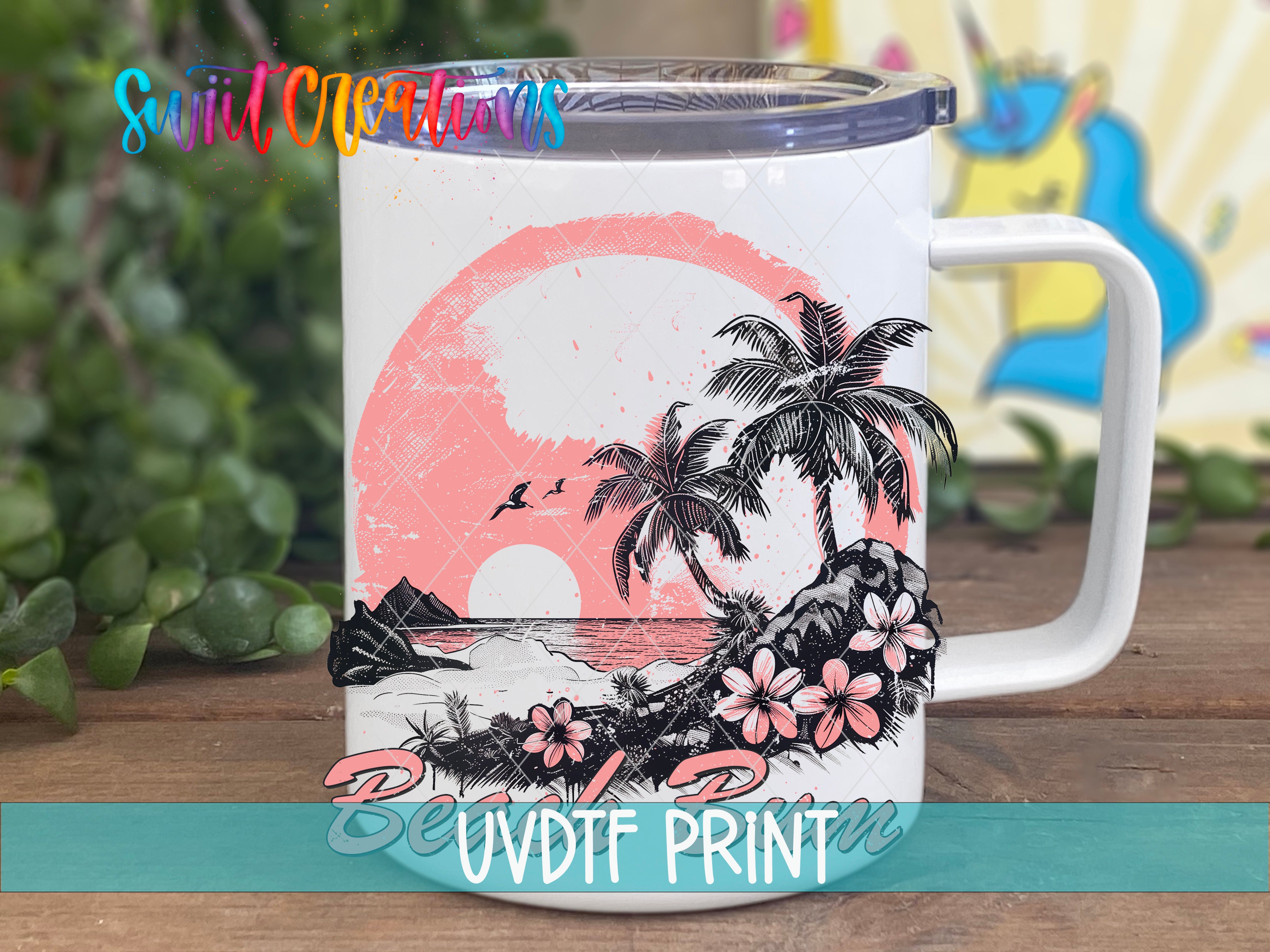 A white mug with a tropical beach scene printed on it, featuring palm trees, a sunset, and flowers.