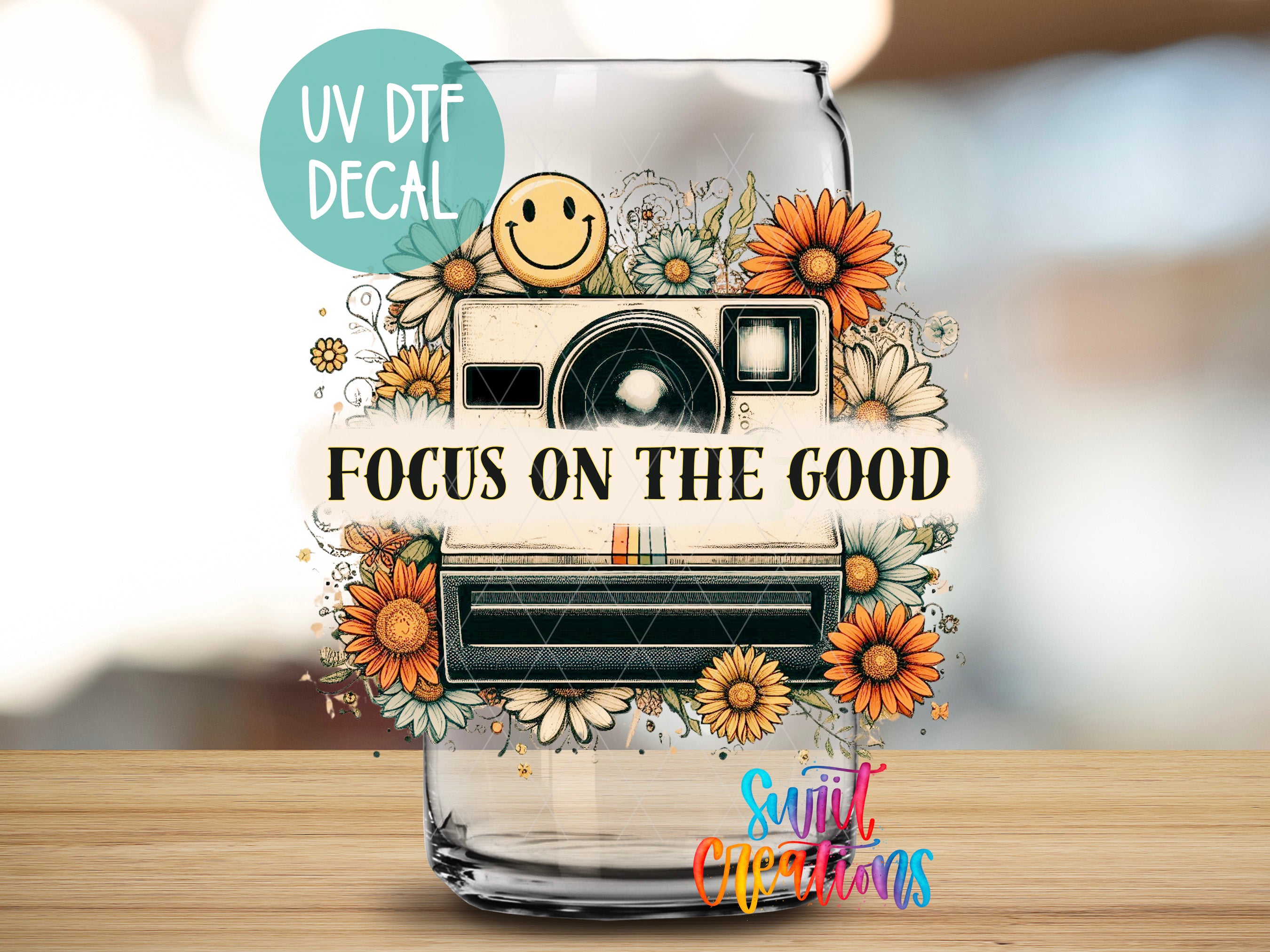 a glass with a picture of a camera on it