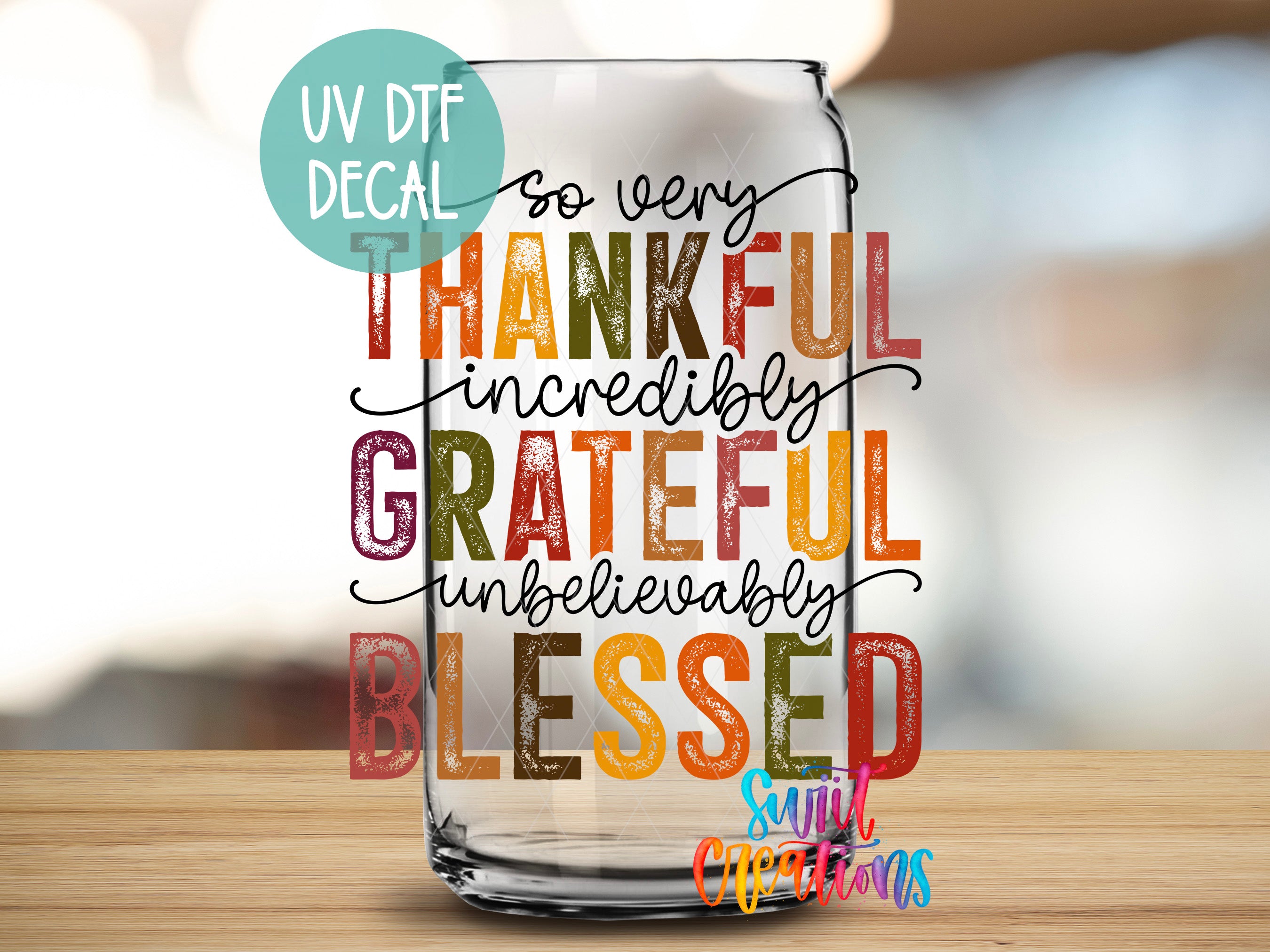 a glass with the words grateful on it