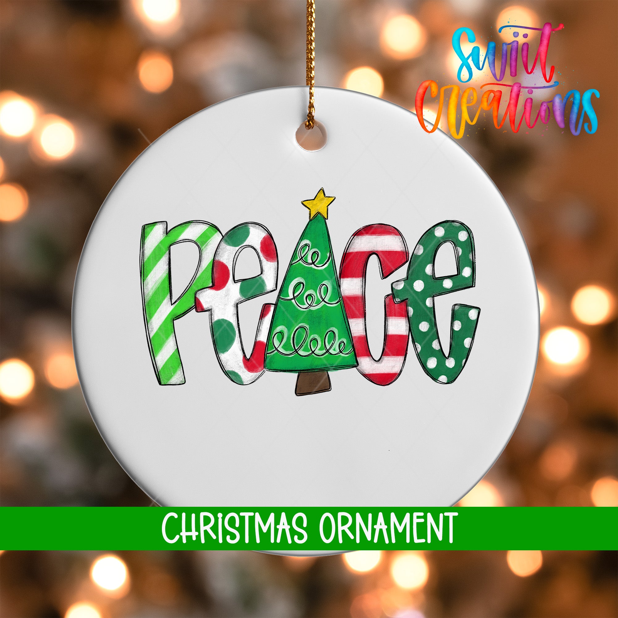 A white Christmas ornament with the word "Peace" spelled out in colorful letters, featuring a Christmas tree design.