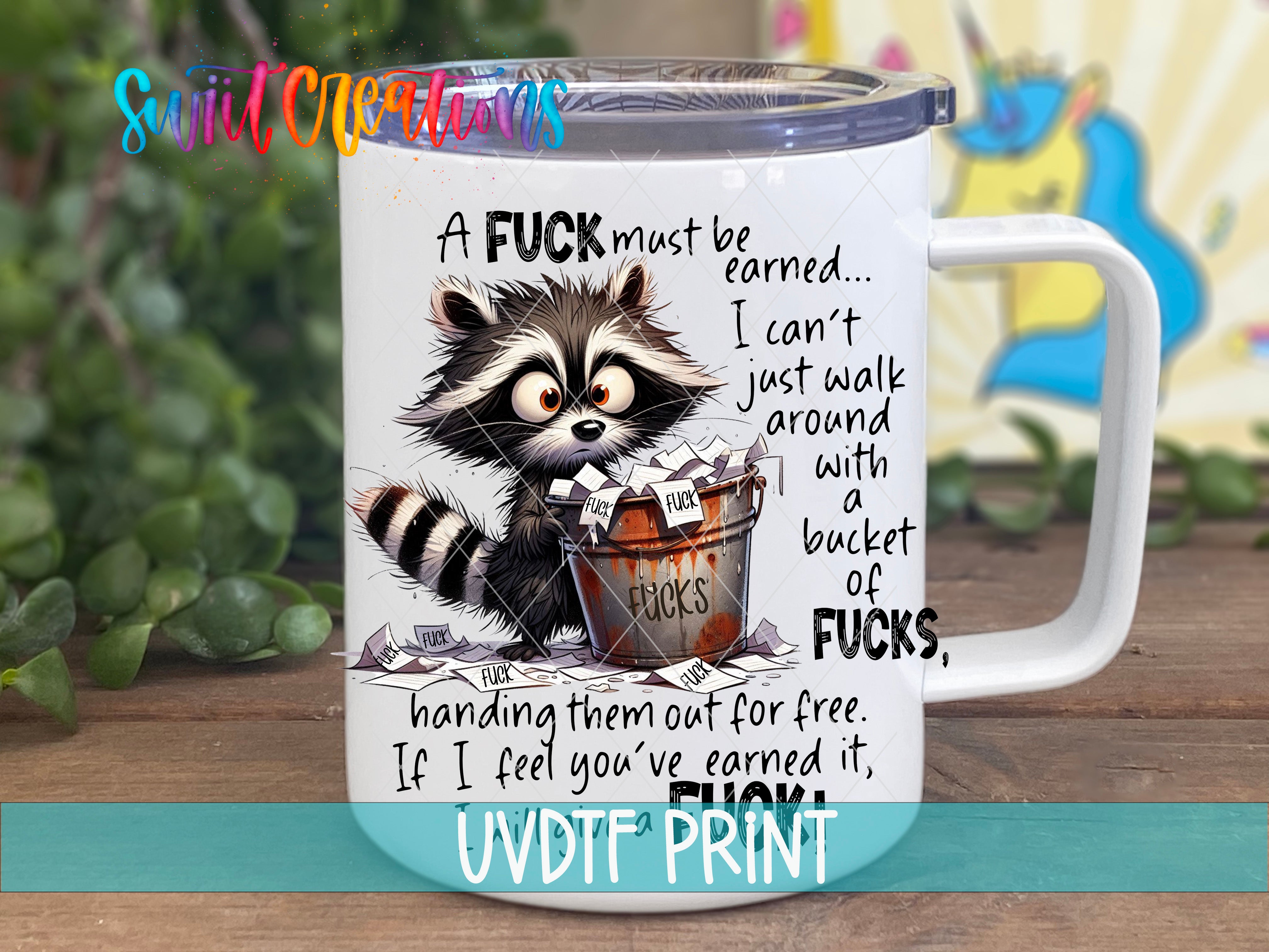 A mug with a raccoon and text on it.