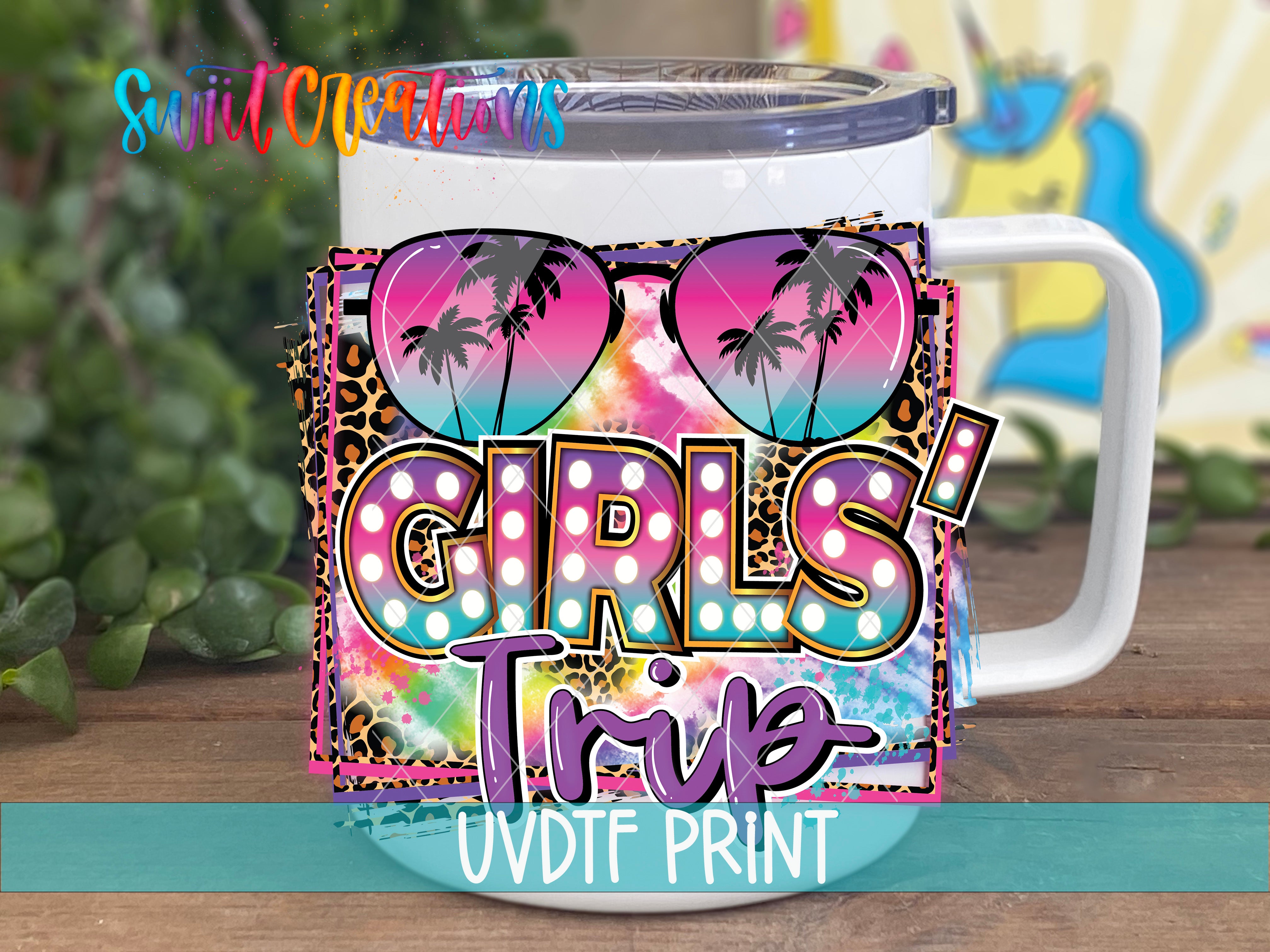 A colorful mug with a tropical design, featuring sunglasses and palm trees, along with the text "GIRLS' TRIB" and "UVDF PRINT".