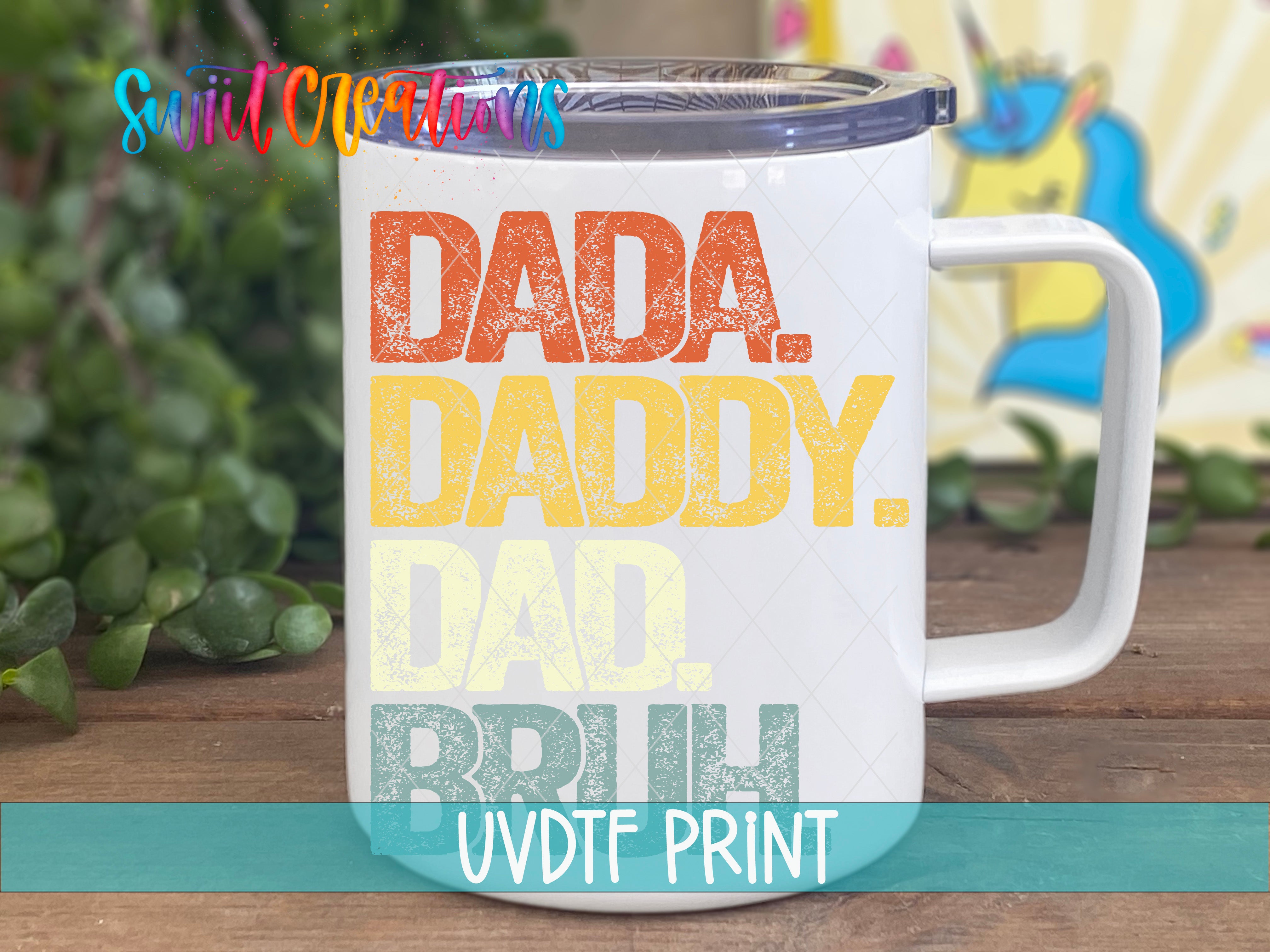 A white mug with the text "Dada. Daddy. Dad. Bruh" printed on it, along with a unicorn graphic in the background.