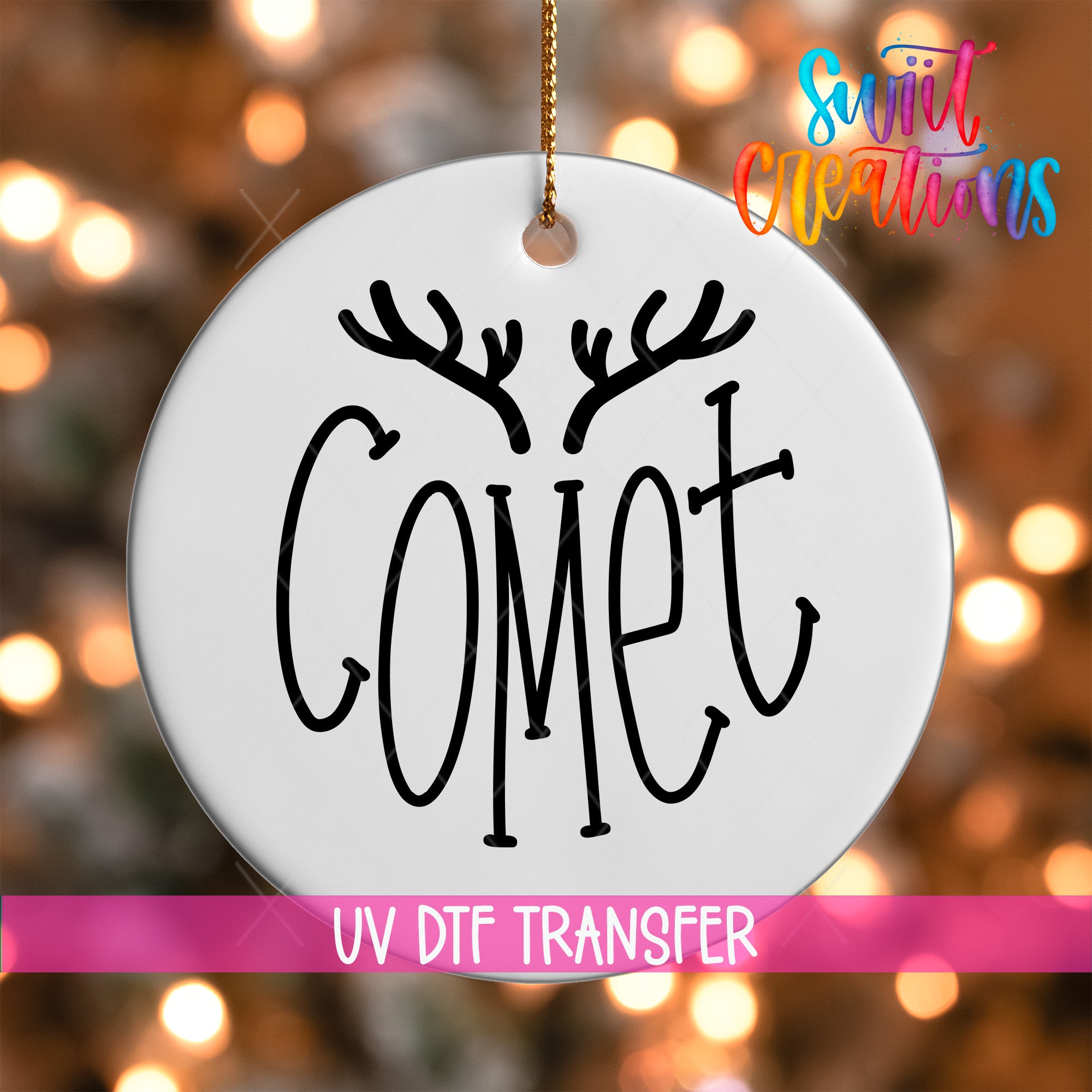 A white ornament with the word "Gomet" written on it, hanging against a background of colorful lights.