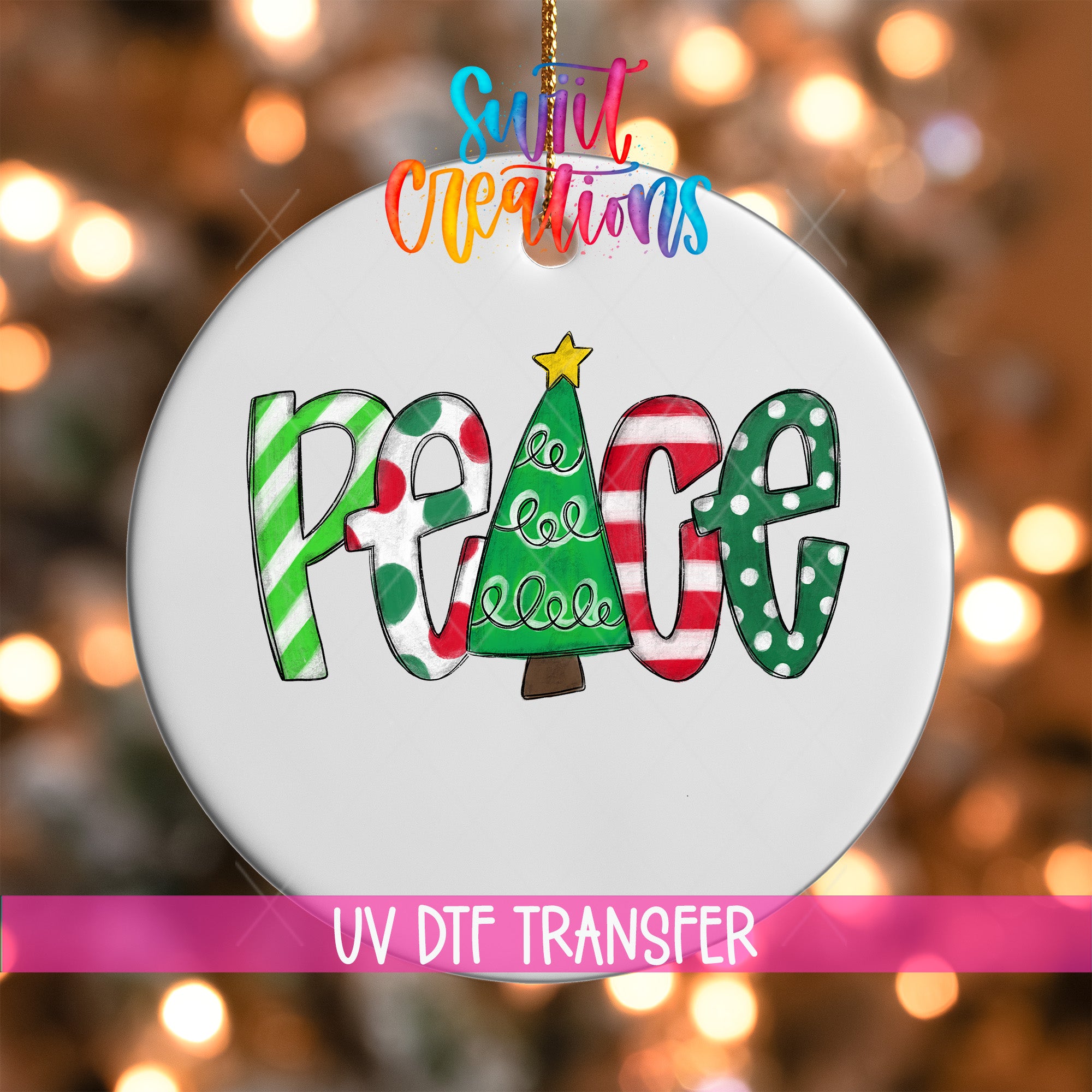 A white ornament with the word "Peace" written on it, featuring a Christmas tree design.