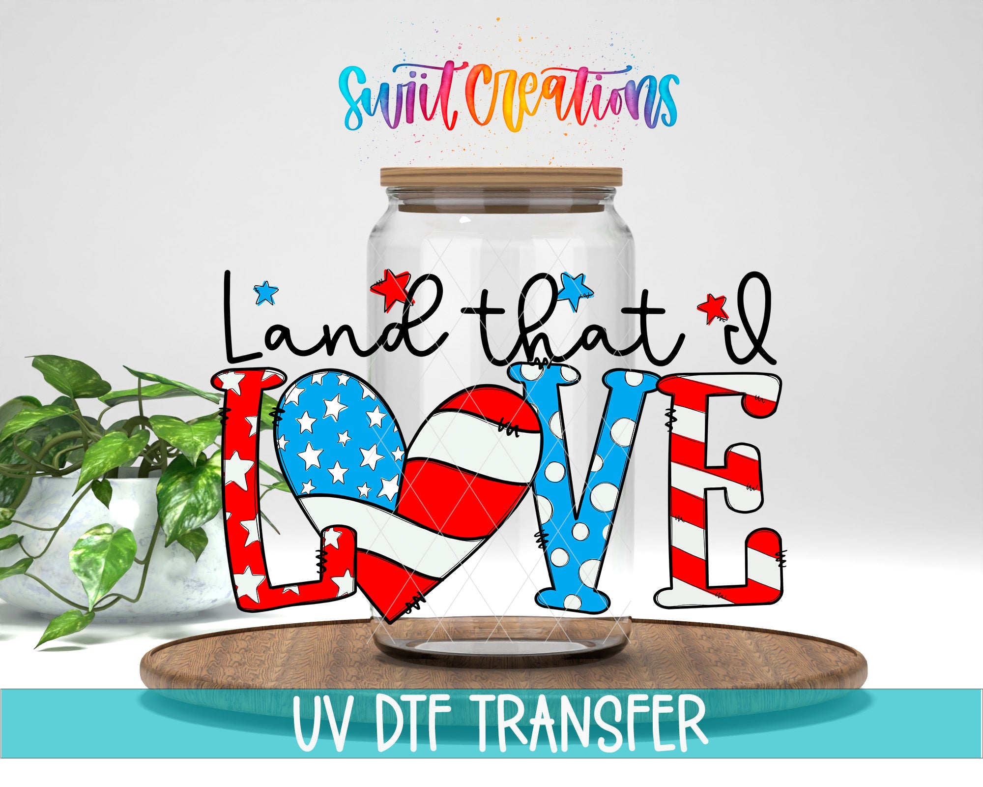 a clear glass jar with a wooden lid, surrounded by a plant and a wooden board. The jar has a design that resembles the American flag, with stars and stripes. The text "Land that I LOVE" is displayed in a stylized font on the jar, and the phrase "UV DFT Transfer" is written below the jar.