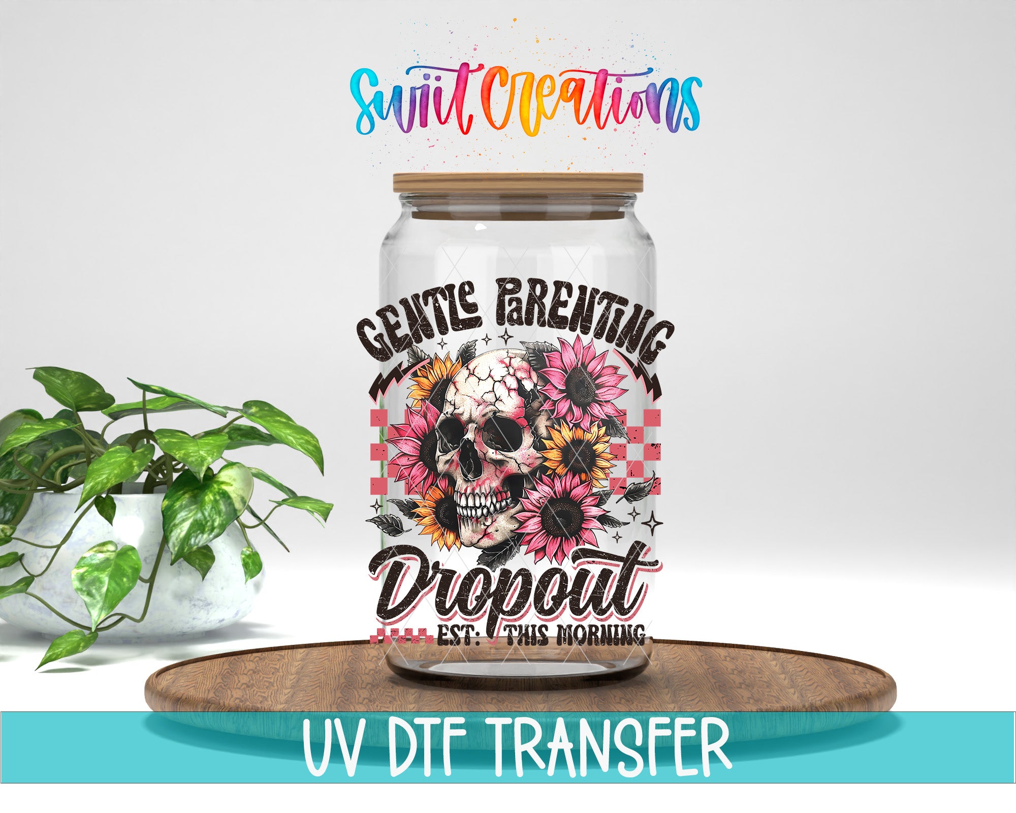 a glass jar with a skull and sunflower design, placed on a wooden surface. The jar has a lid and is surrounded by a potted plant. The text above the jar reads "Swift Creations" and "GENTLE PARENTING DROPOUT EST. THIS MORNING". The image also includes the text "UV DFT TRANSFER".