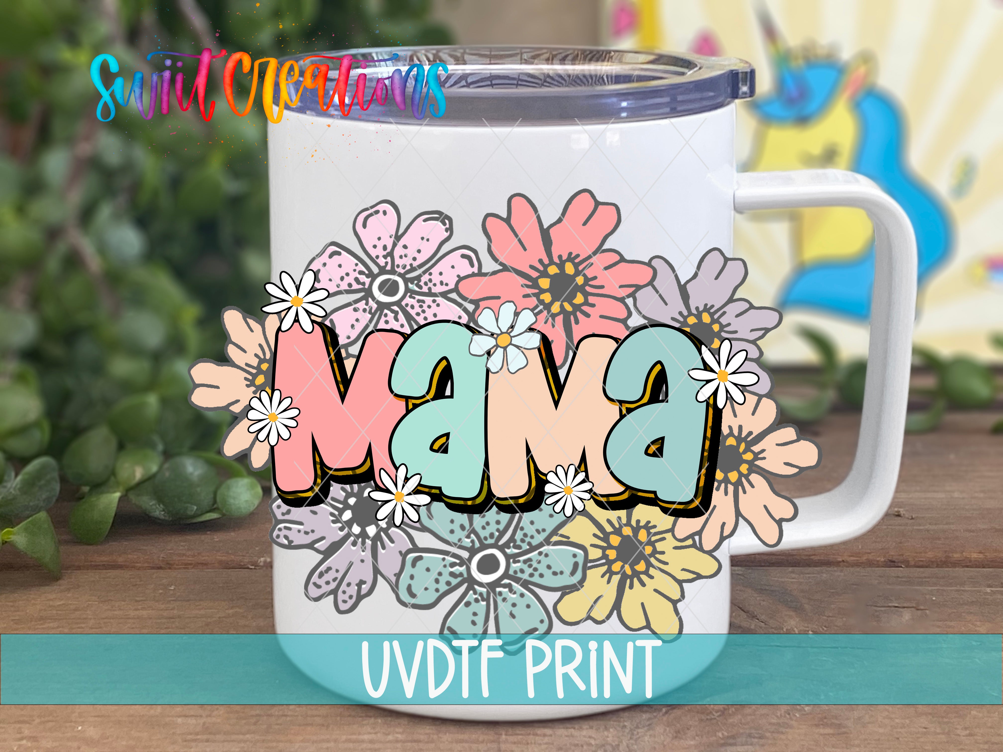 A white mug with a colorful floral design and the word "Mama" printed on it.