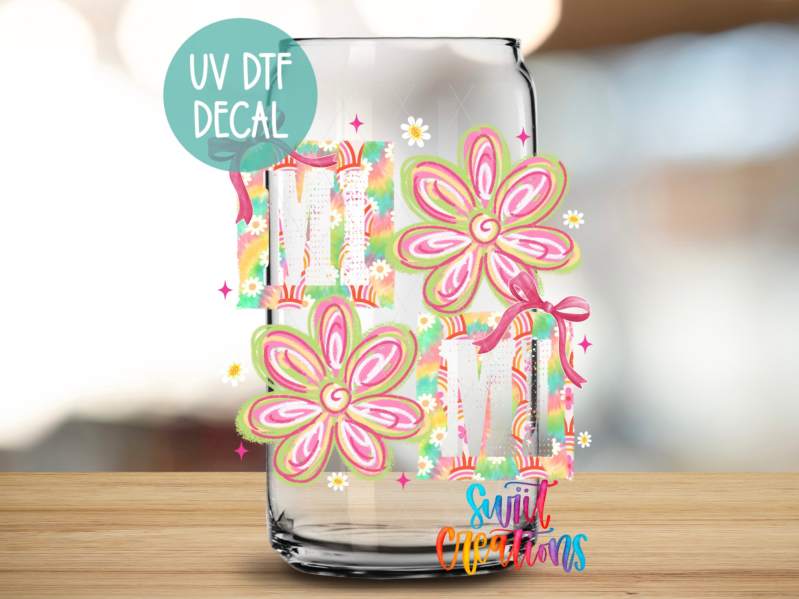 A glass jar with a UV decal featuring colorful floral designs and the text "UV DTF DECAL" on it.