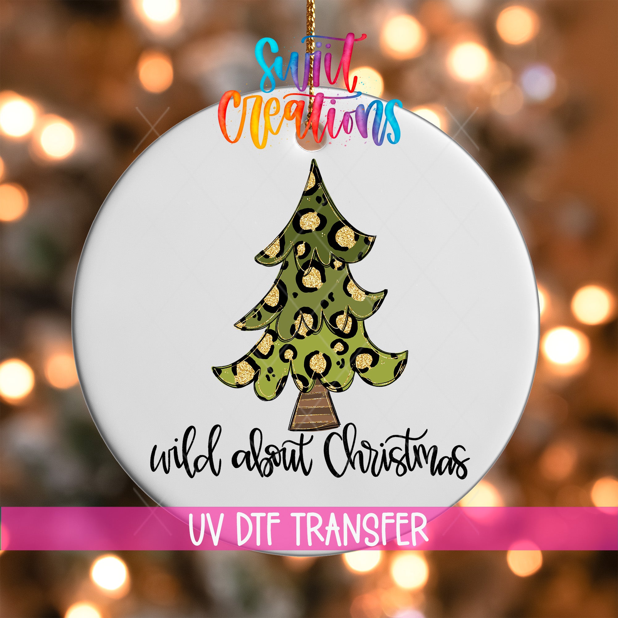 A white Christmas ornament with a leopard print design and the text "wild about Christmas" printed on it.
