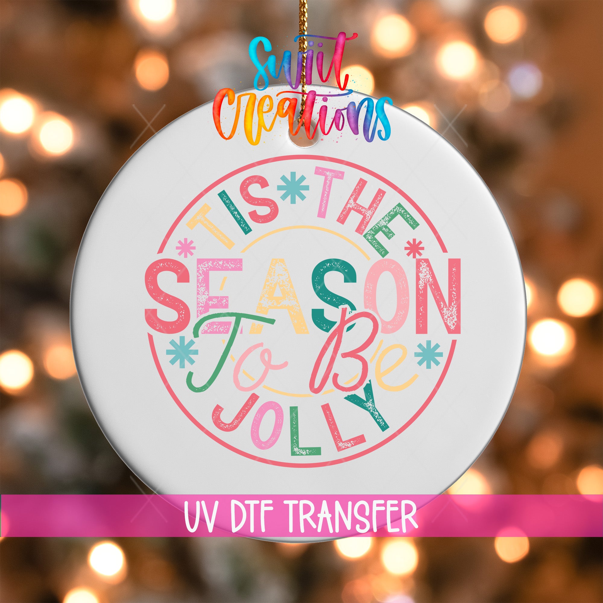 A decorative ornament with the text "TIS THE SEASON TO BE JOYLY" in a colorful, stylized font.