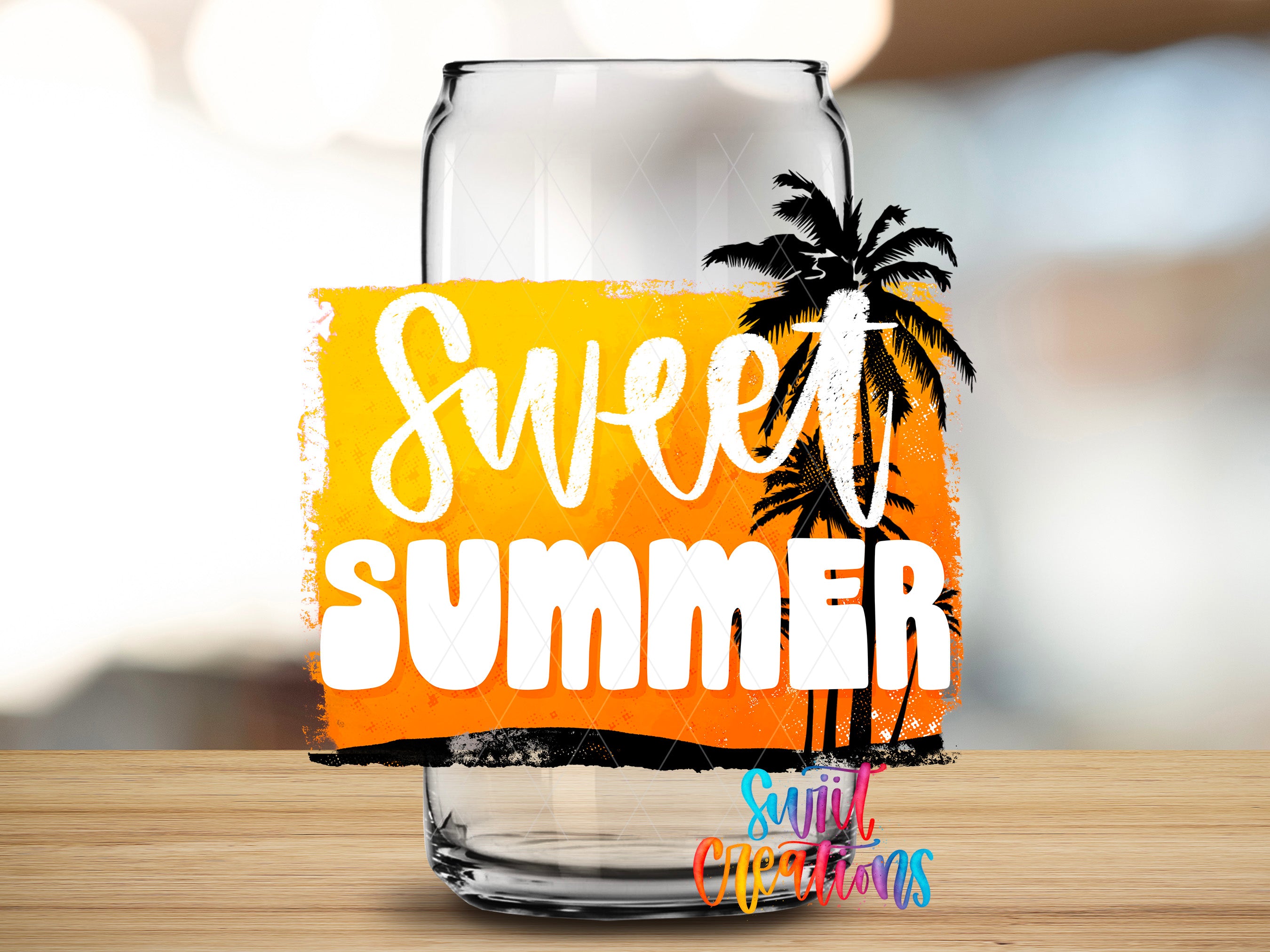 a glass with the text "Sweet Summer" written on it, along with a palm tree graphic.