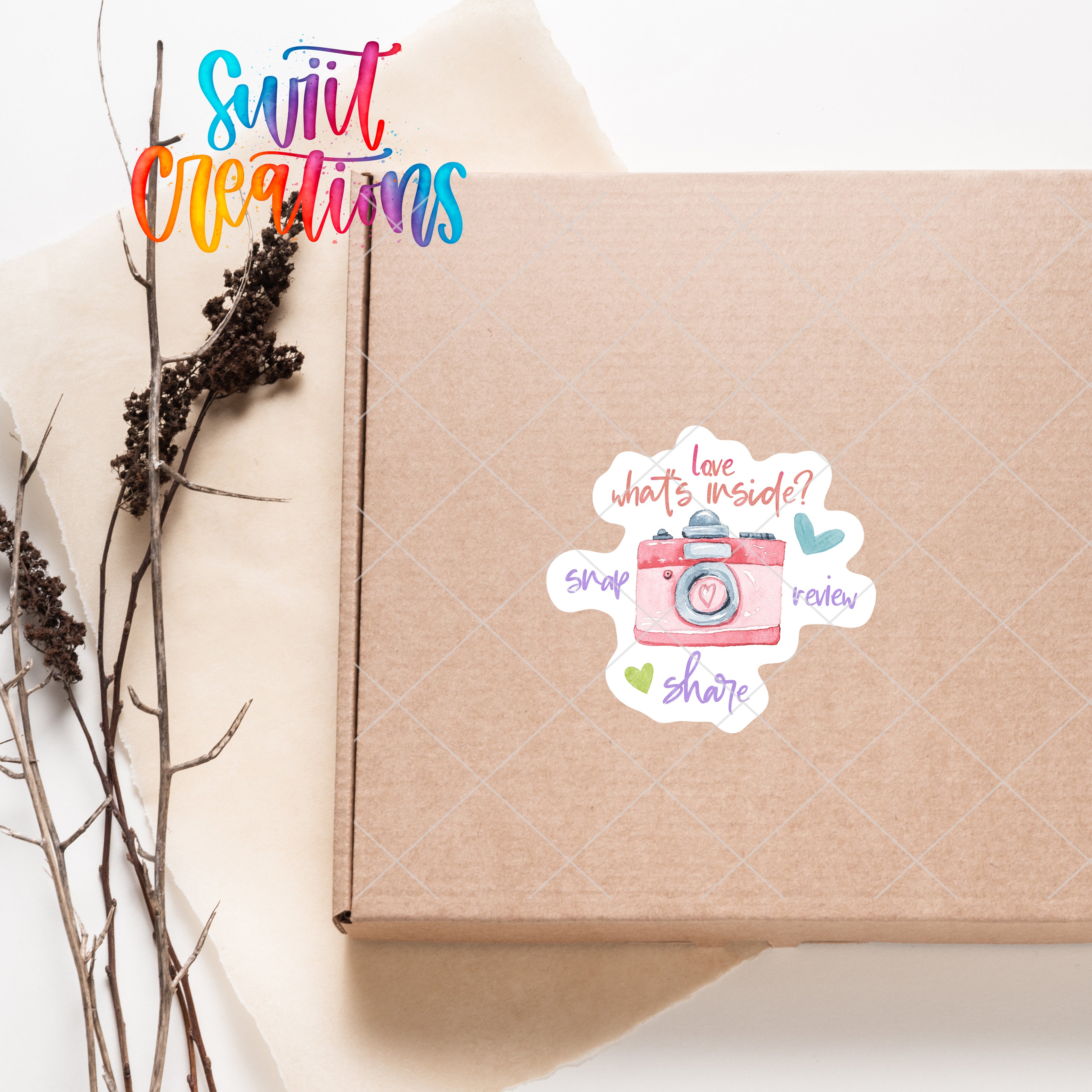 a brown box with a sticker of a camera