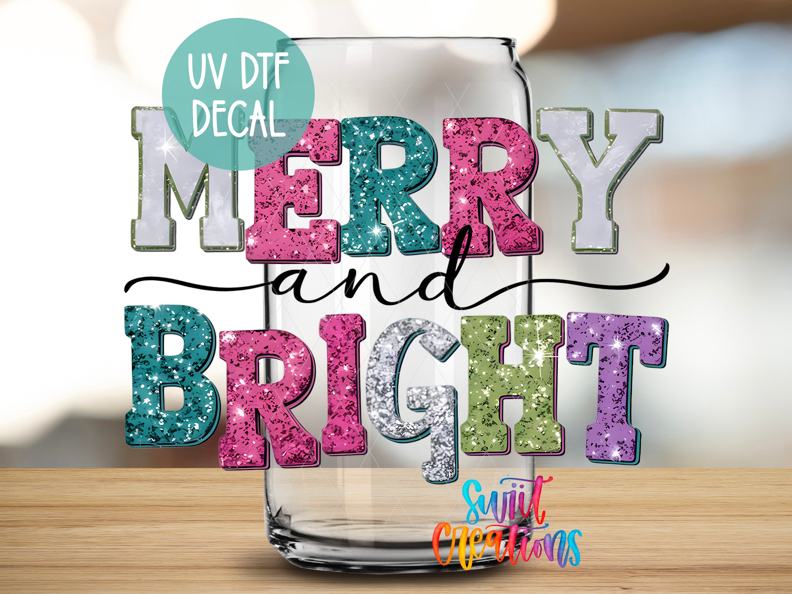 a glass with merry and bright lettering on it