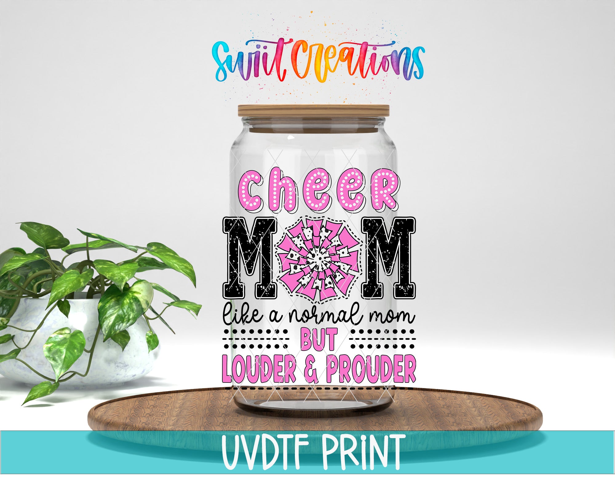 a glass jar with a printed design on it, placed on a wooden surface. The design includes text and graphics related to cheerleading and a mother figure.