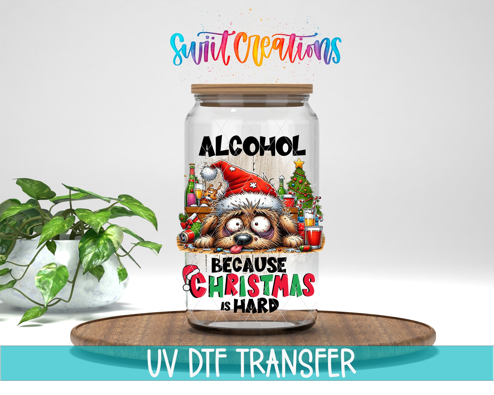 a glass jar with a label that says "ALCOHOL BECAUSE CHRISTMAS IS HARD" and includes a cartoon image of a dog wearing a Santa hat. The jar is placed on a wooden surface, and there is a potted plant in the background.