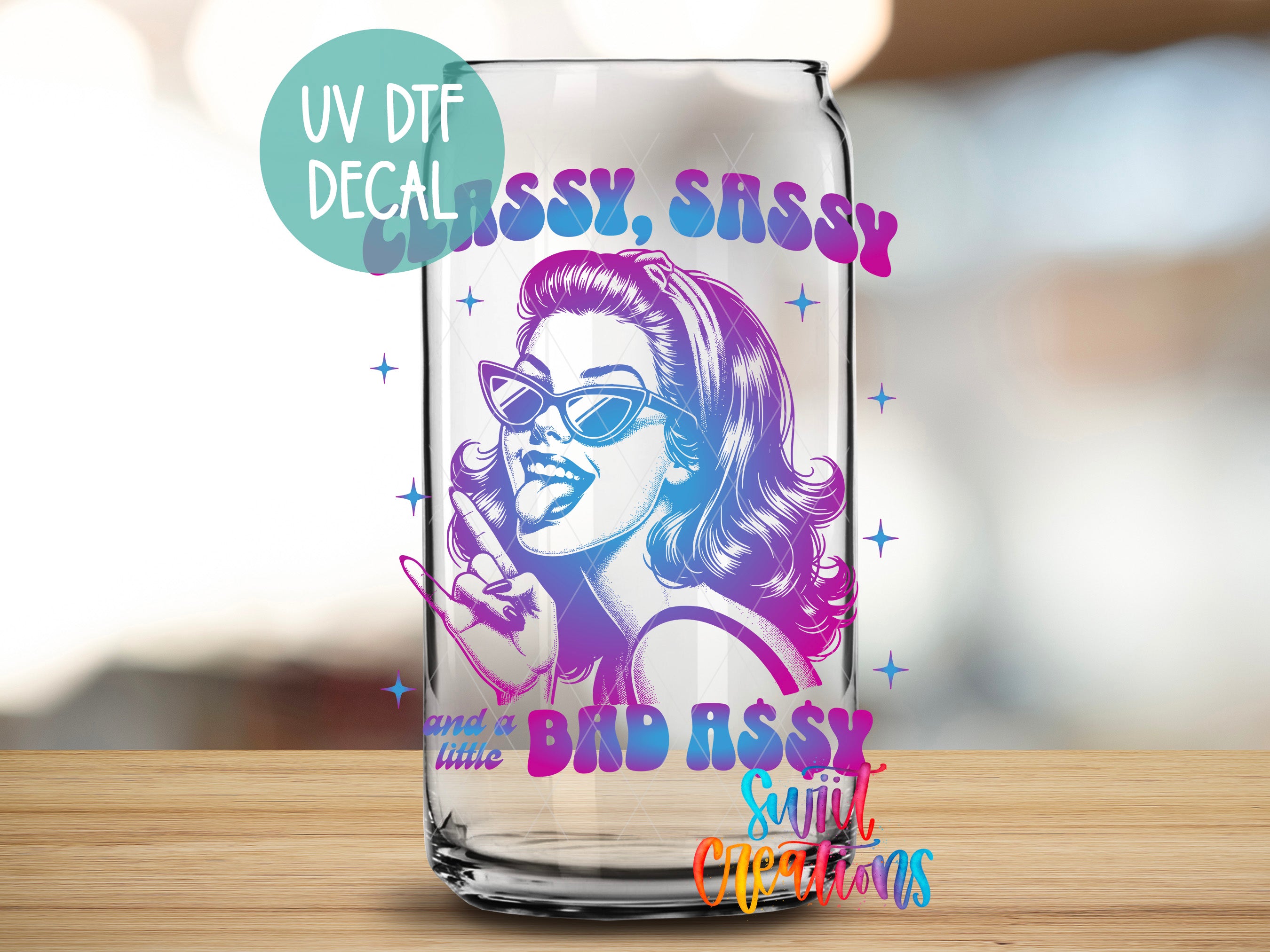 A glass can with a colorful graphic design featuring a woman's face wearing sunglasses and a playful expression.