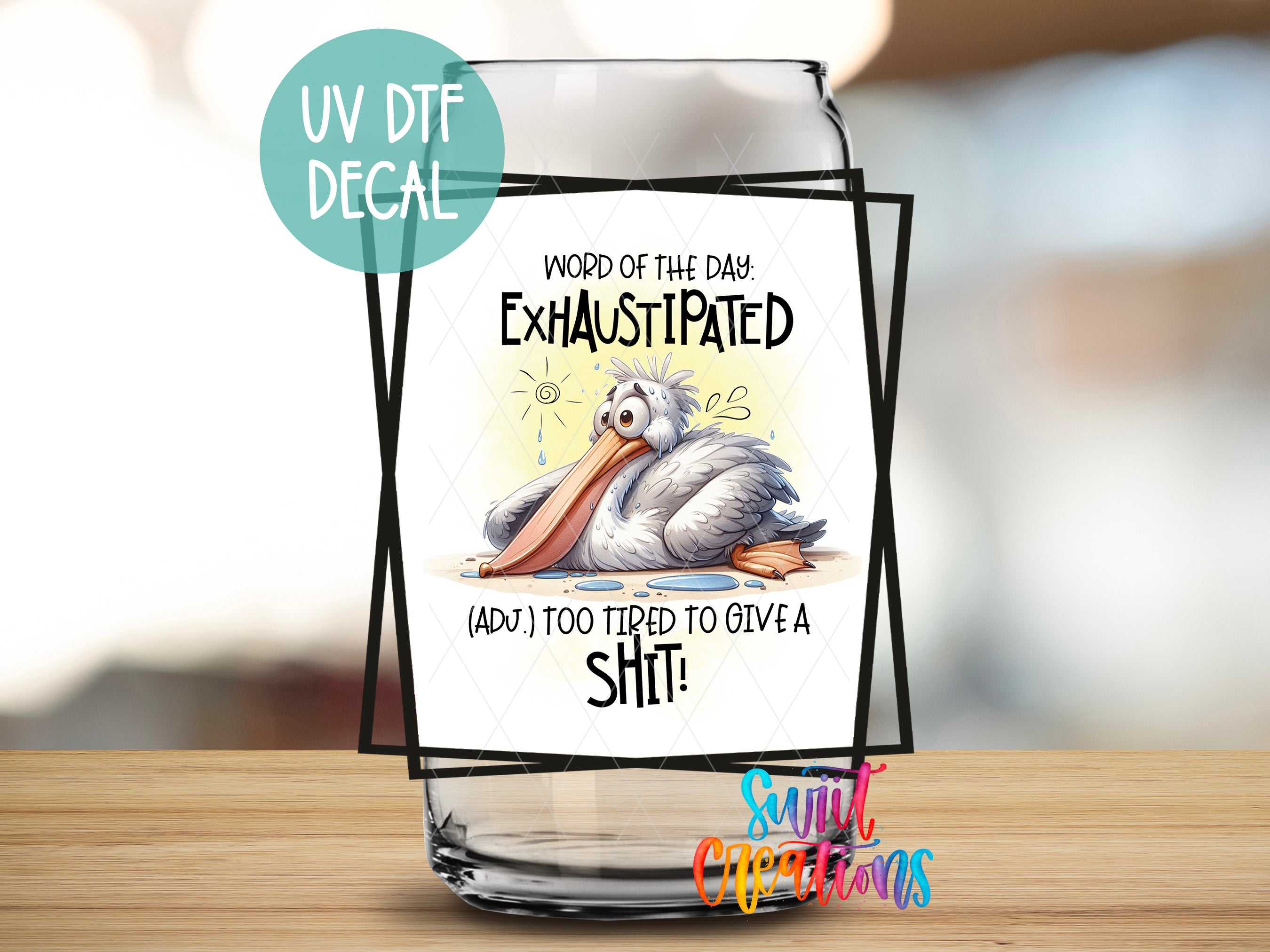 a glass with a picture of a pelican on it