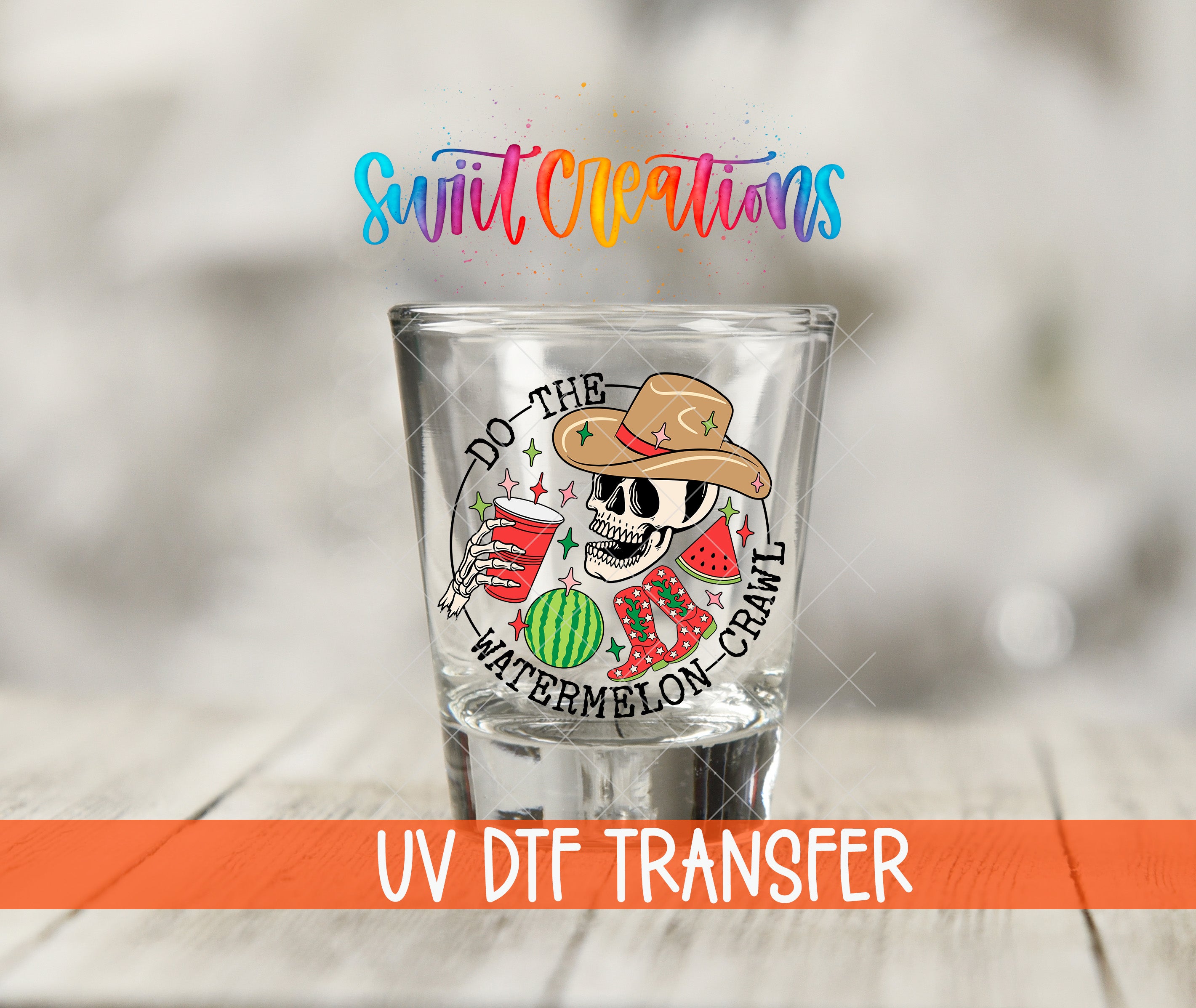 A shot glass with a skull wearing a cowboy hat and holding a watermelon, along with the text "Do the WATERMELON CRAWL" and "UV Dtf Transfer".