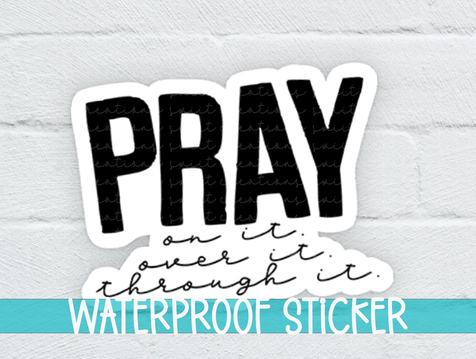 a sticker with the words pray on it