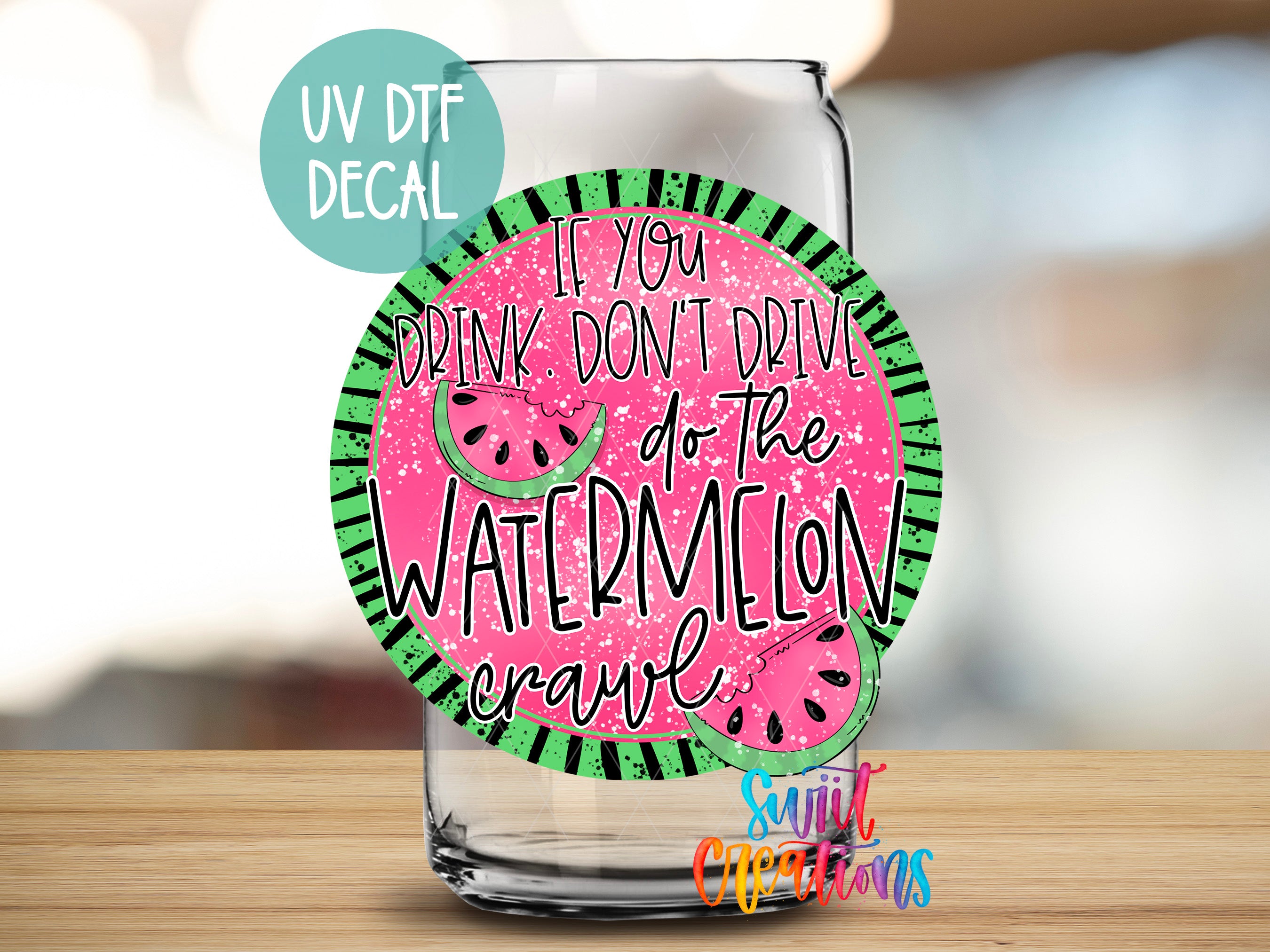 a watermelon drink glass sitting on top of a wooden table