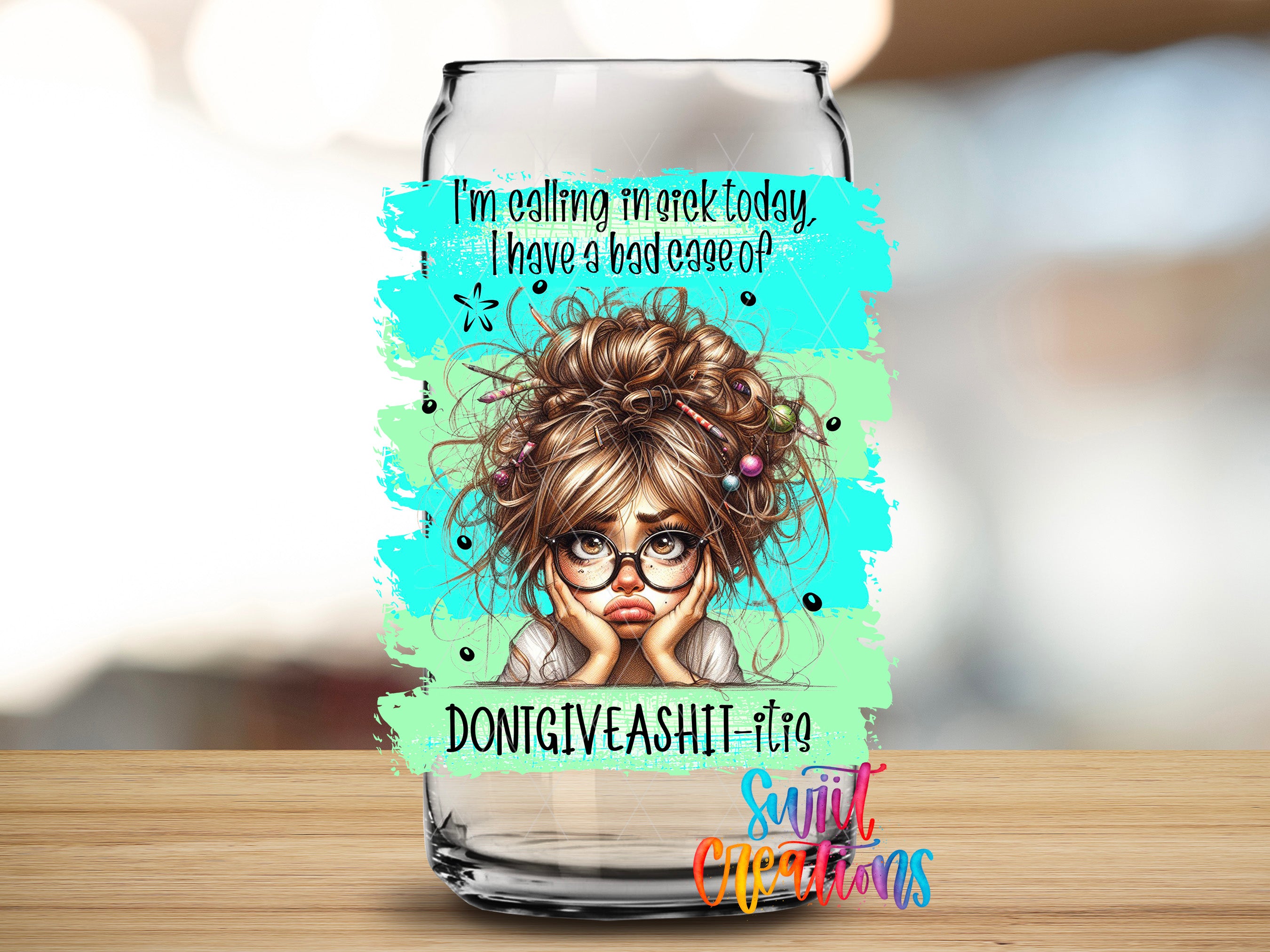 a glass jar with a colorful illustration of a woman with messy hair and glasses, along with text that reads "I'm calling maketh today, I have a bad case of DONIGIVEASHITil.com" and "Suitcase Creations".