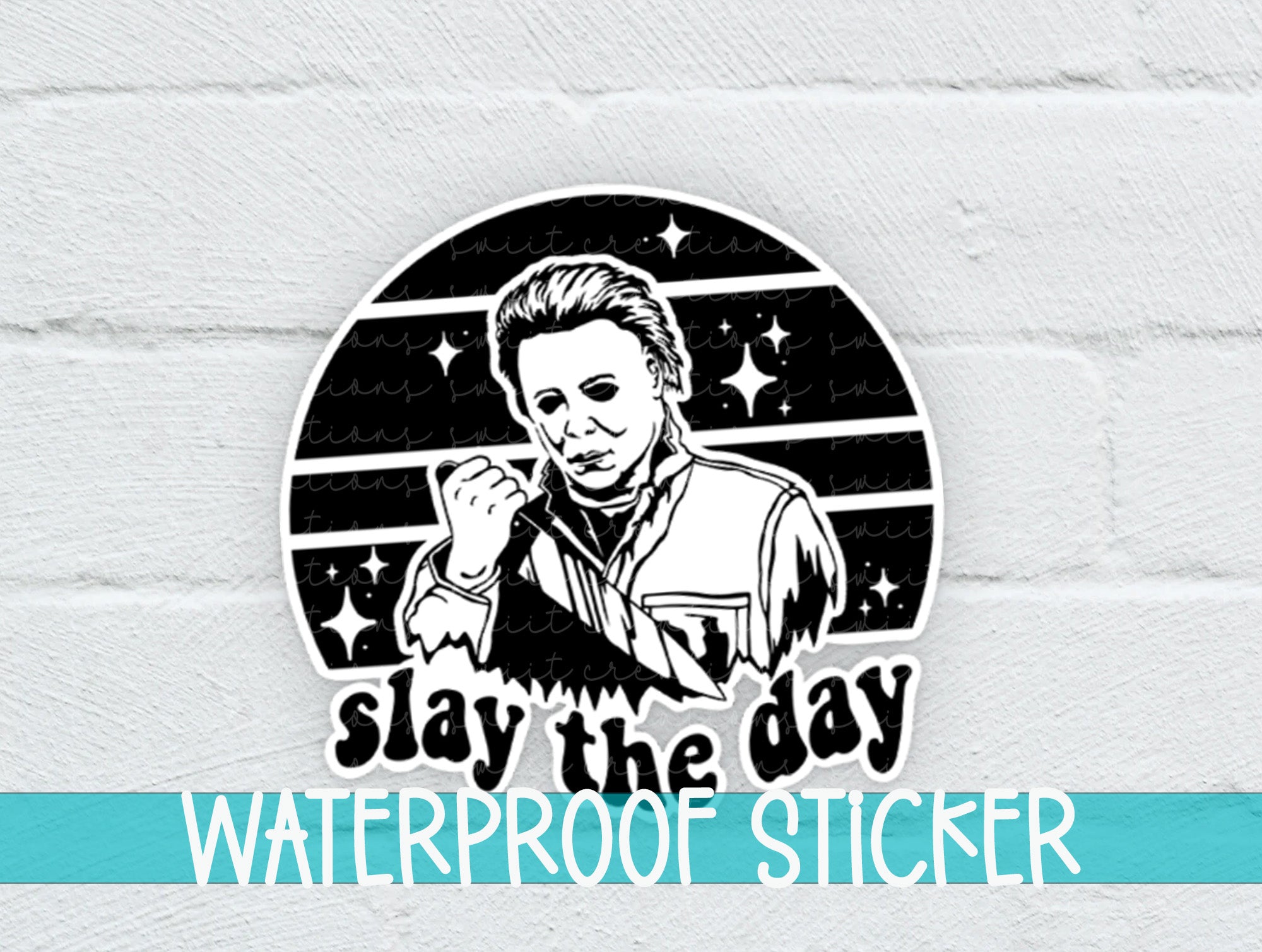 a white brick wall with a black and white sticker on it