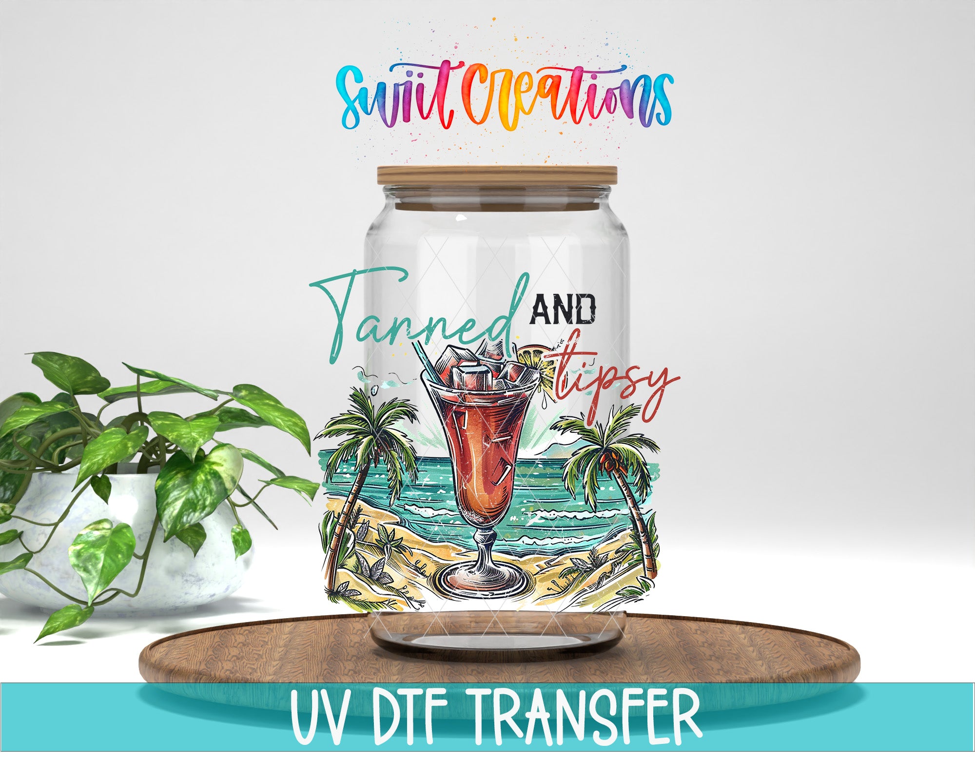 a glass jar with a tropical beach scene and a drink inside, along with the text "Swift Creations" and "Tanned and Tipsy" printed on it.