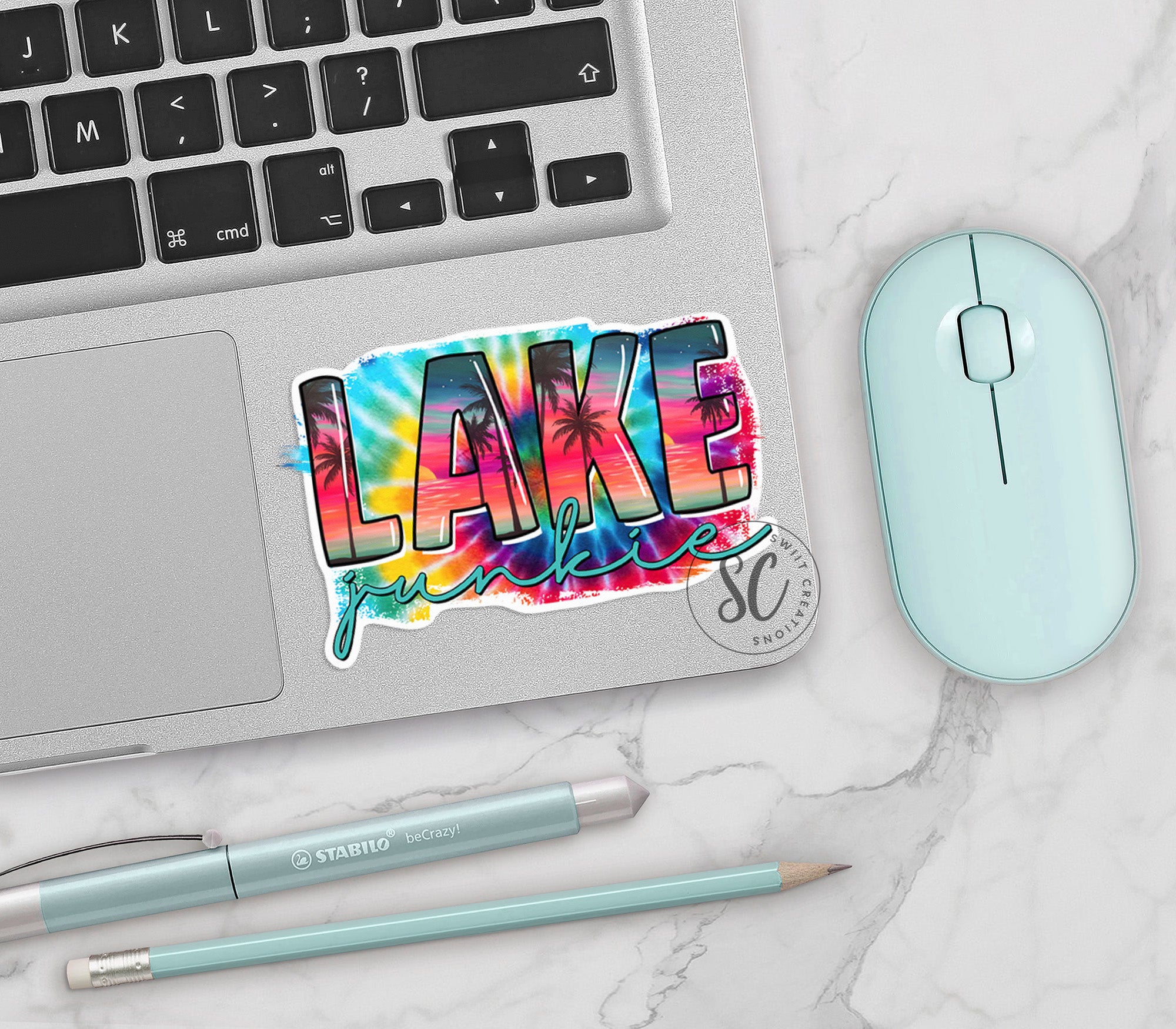 a laptop with a sticker of the word lake on it