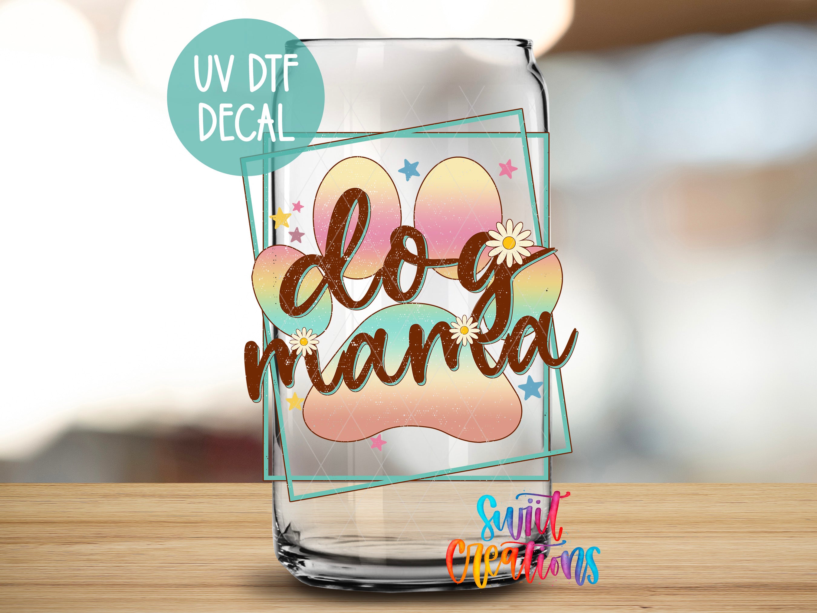 A glass jar with a UV decal featuring a dog paw and the text "dog mama" in a colorful, decorative font.