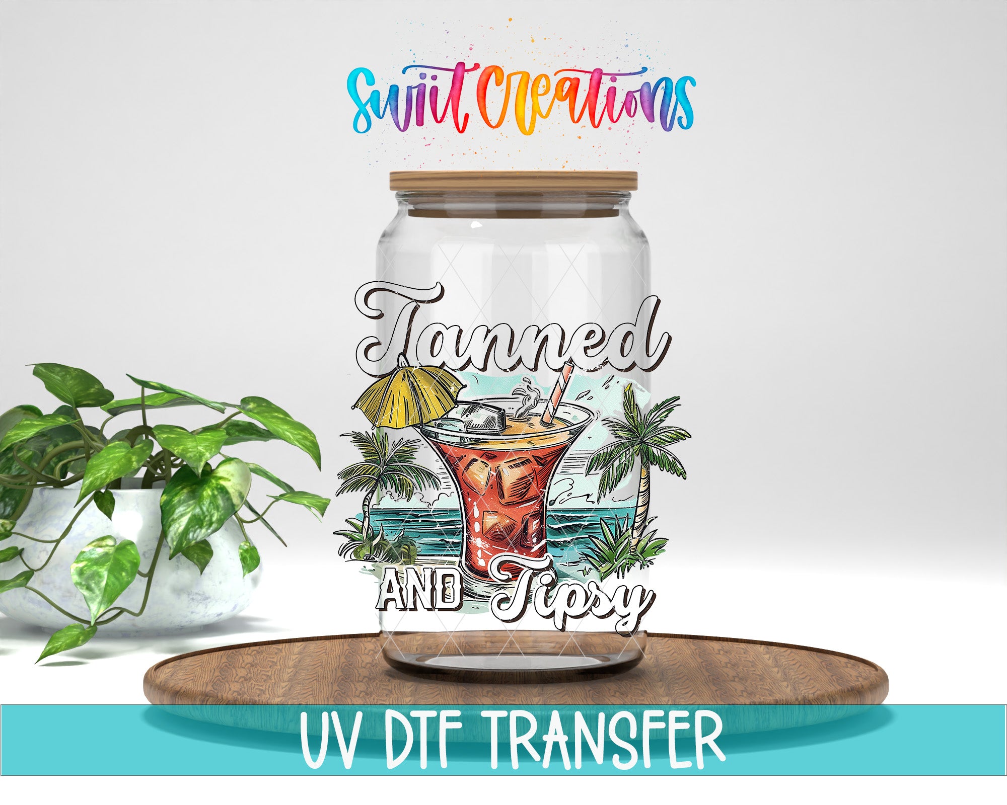 a glass jar with a tropical drink design, placed on a wooden surface. The jar has a label that says "Tanned AND Tipsy". There is also a plant in the background.
