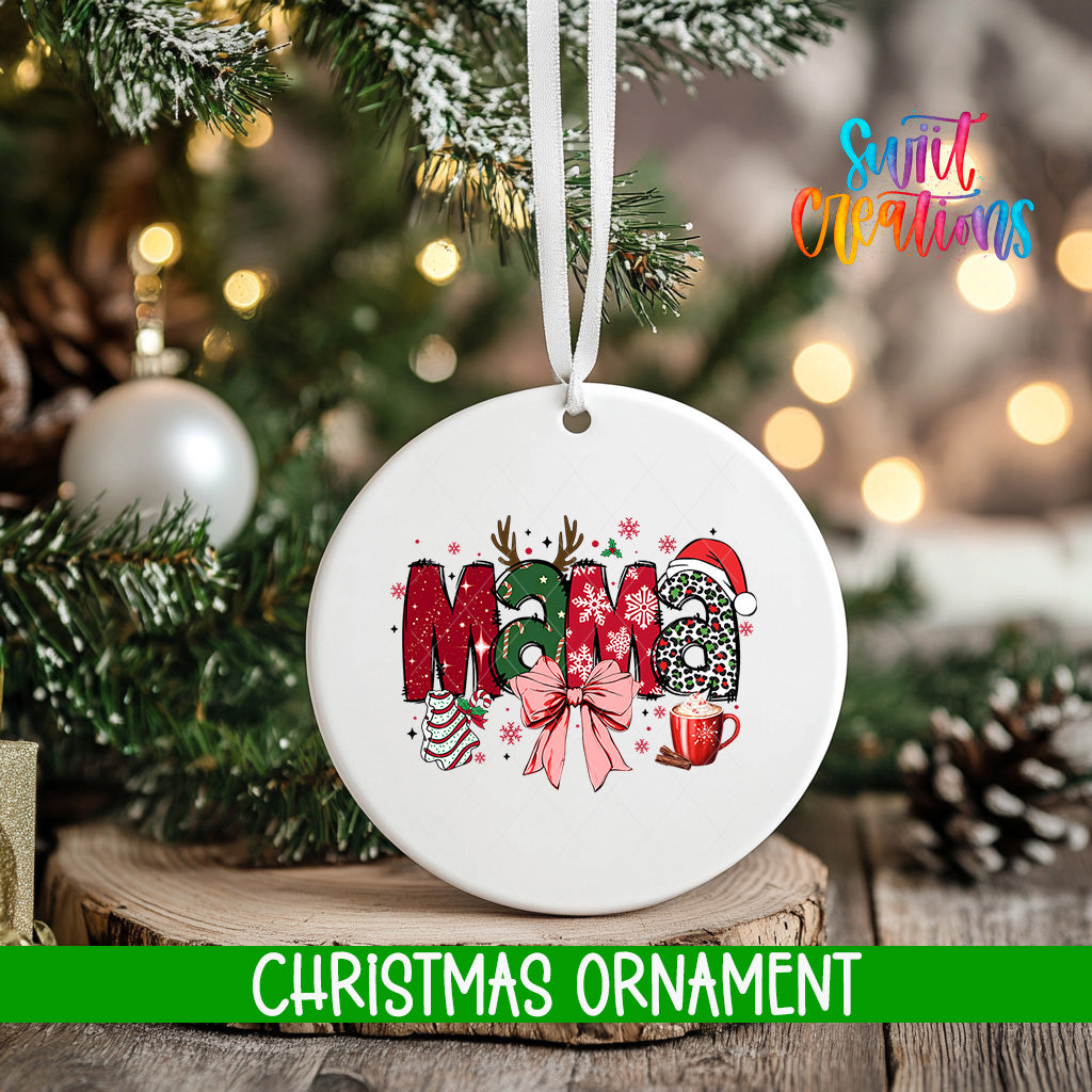 A white Christmas ornament with the word "Mama" written on it, surrounded by various Christmas-themed decorations such as snowflakes, pine cones, and a mug.