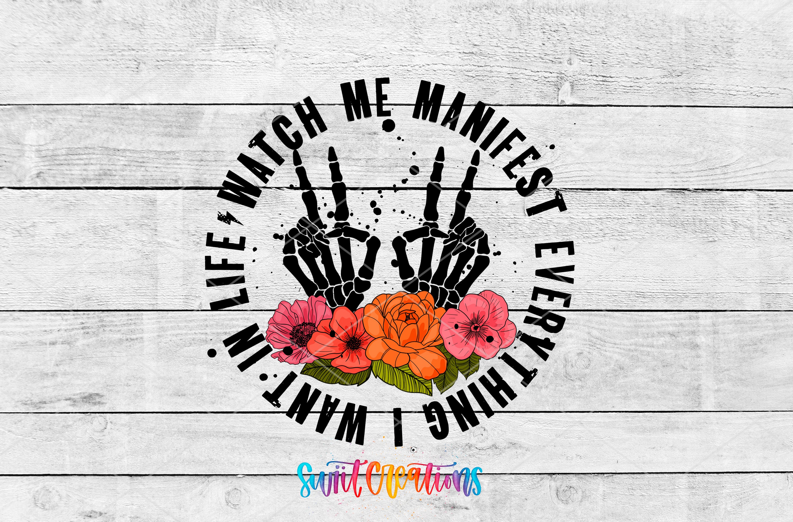 A circular graphic design with the text "Life, watch me, Manifest every thing I want" and two skeletal hands making a peace sign. The design is set against a white wooden background.