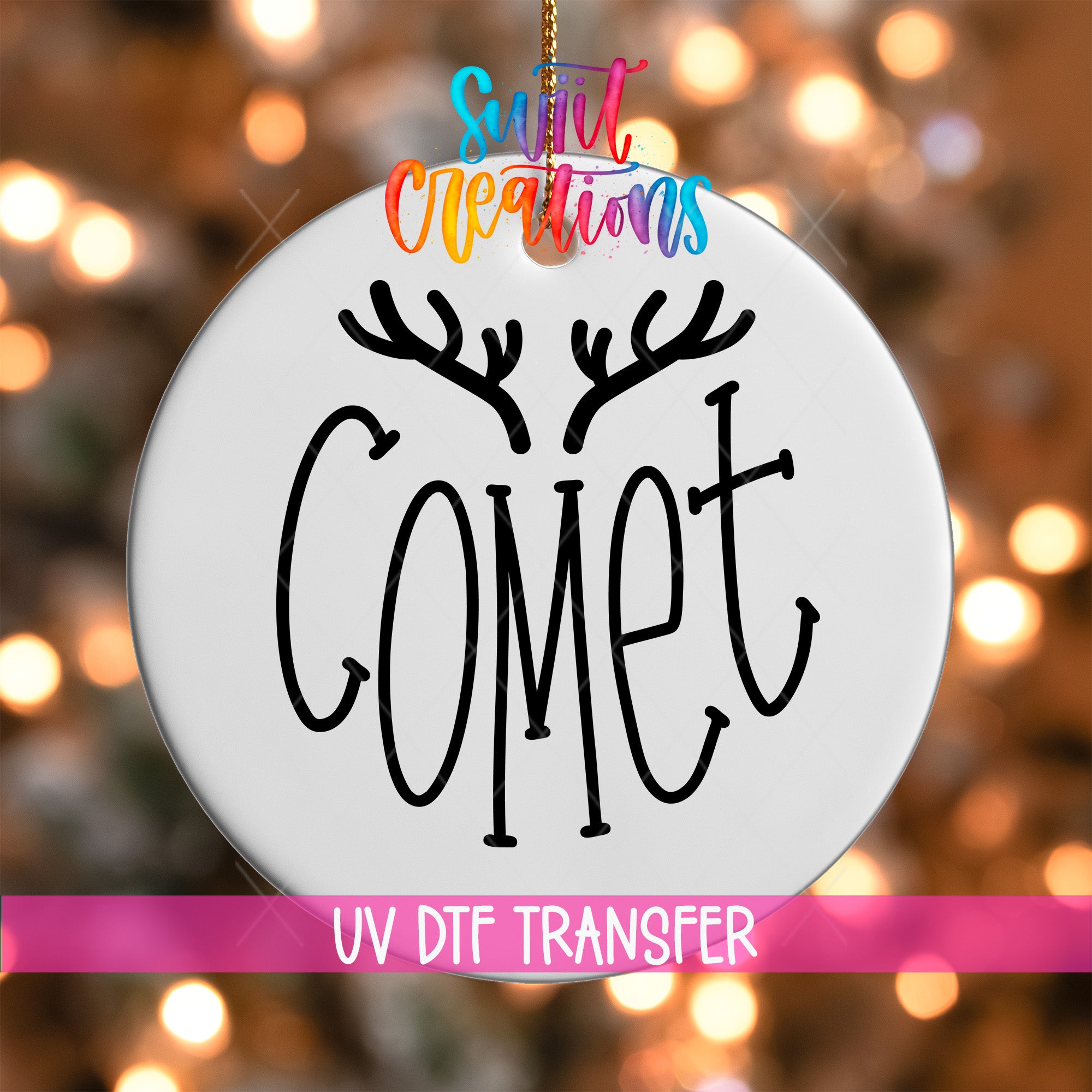 A white ornament with the word "Gomet" written on it, hanging against a background of colorful lights.