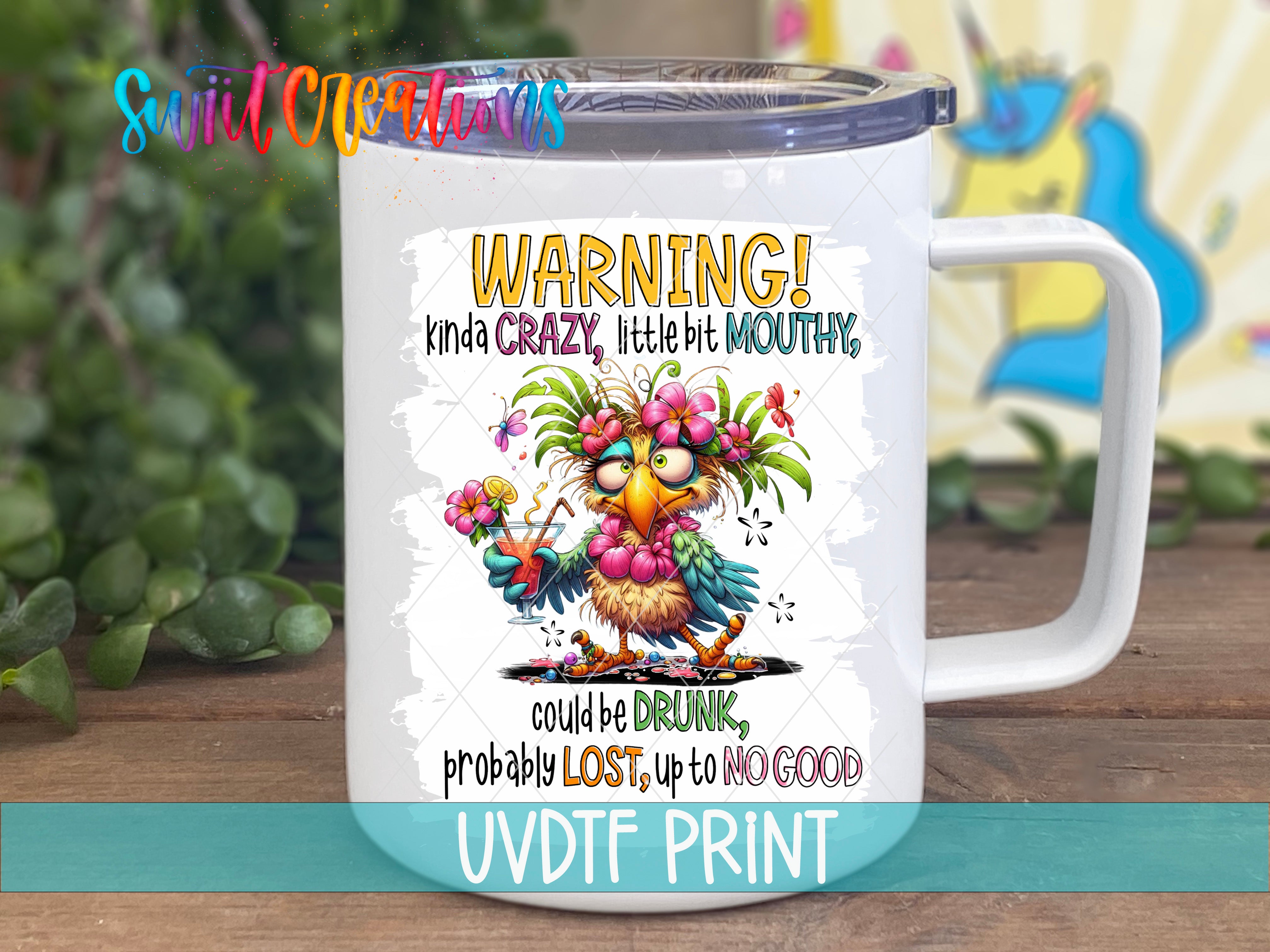 A white mug with a colorful cartoon owl design and text on it.