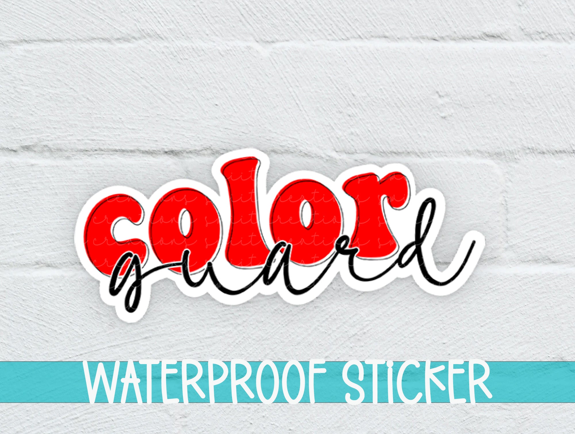 a white brick wall with a red and black sticker on it